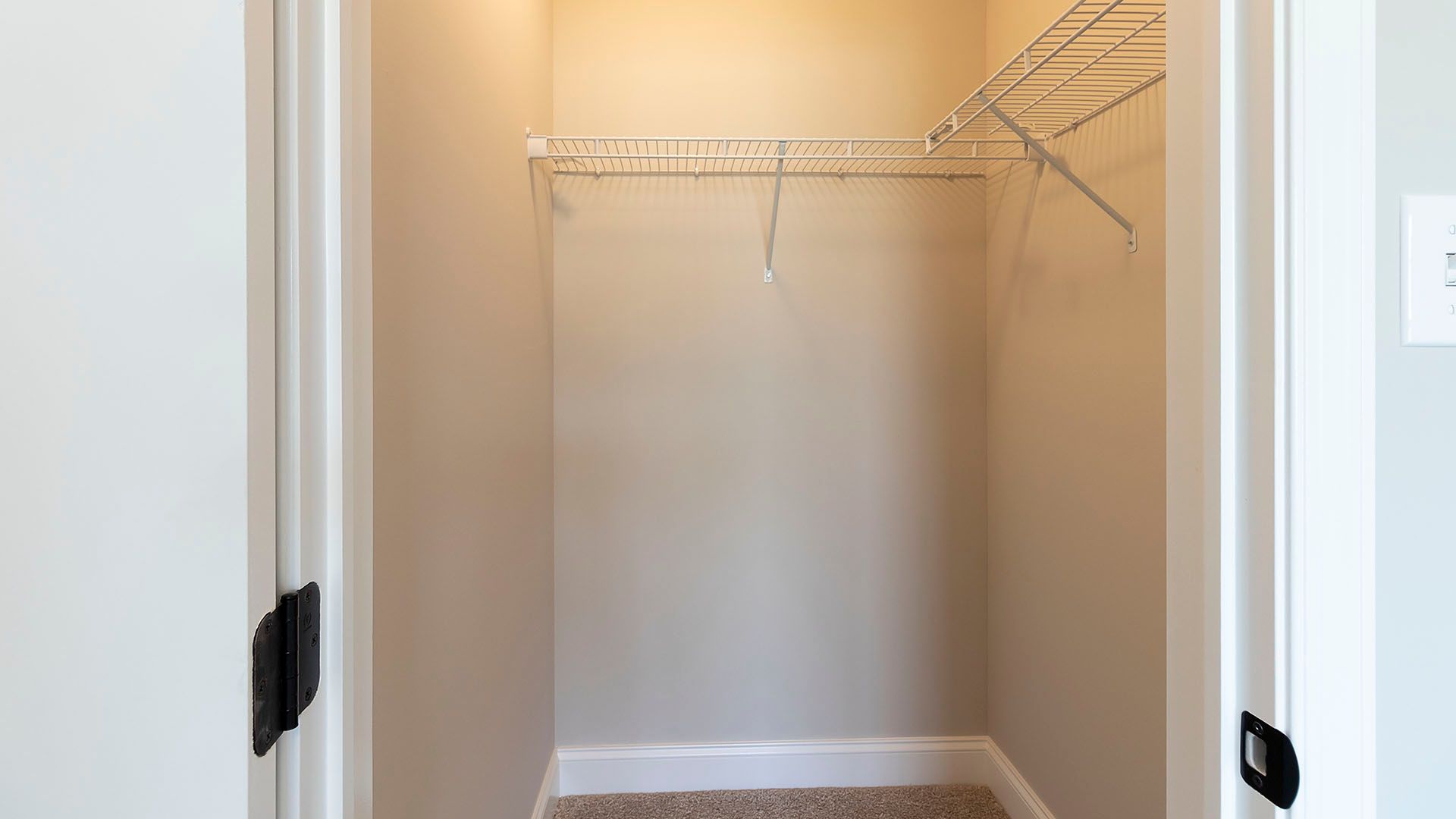 Open closet with wire shelving