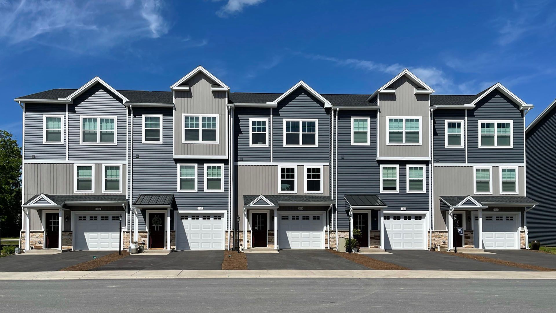 S&A Homes - the Bradfield townhome at Grays Pointe in State College - 3 story townhome with covered entry, 1 car garage, and vinyl siding