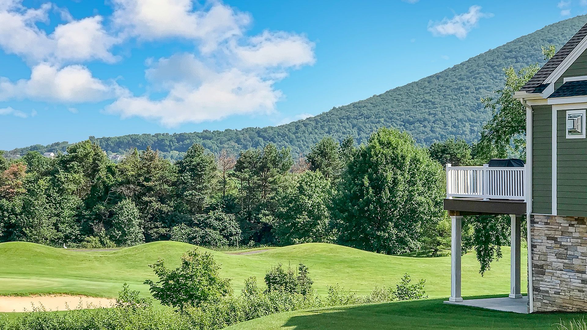 S&A Homes Village at Canterbury in State College - rear deck overlooking the Centre Hills Golf Course and Mt. Nittany.