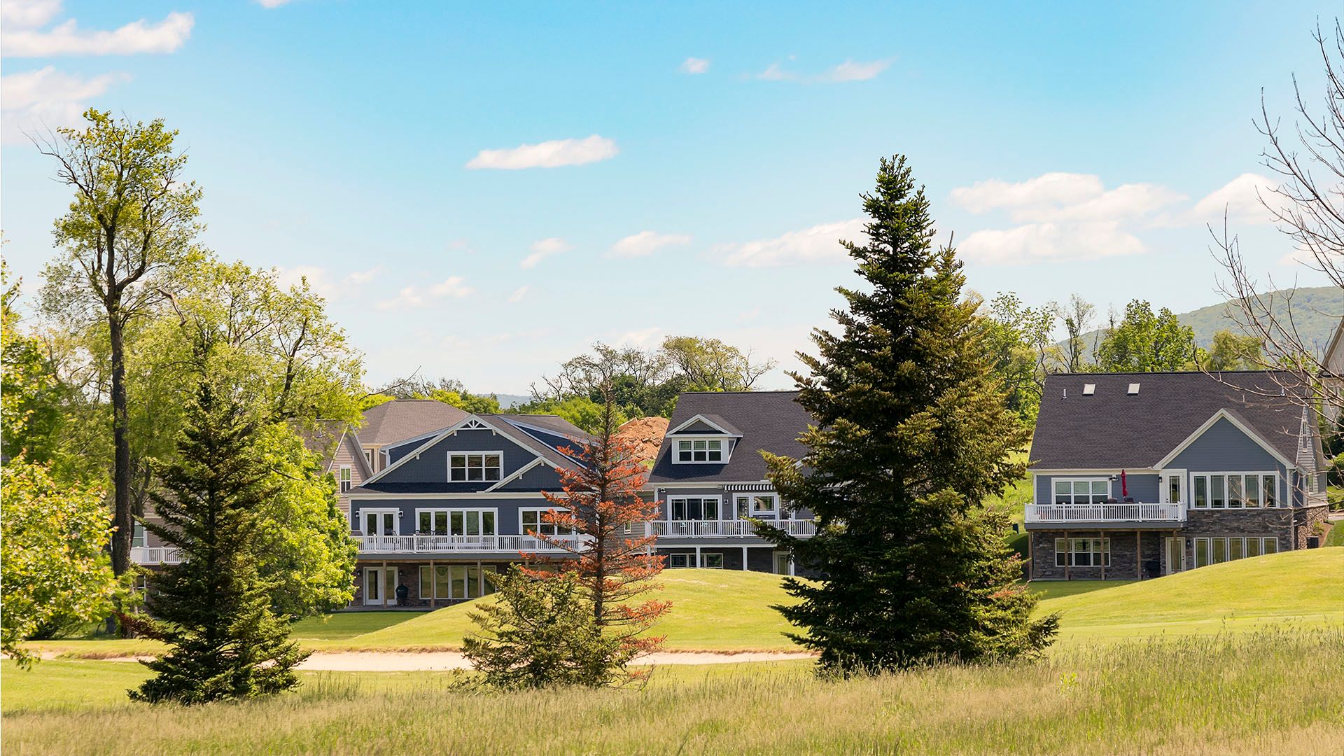 Homes backing to golf course and tree line - Village at Canterbury in State College