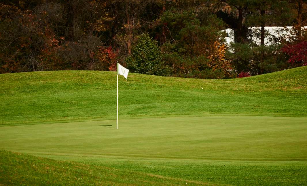 Fall foliage on the Centre Hills Golf course near Village at Canterbury - by S&A Homes in State College