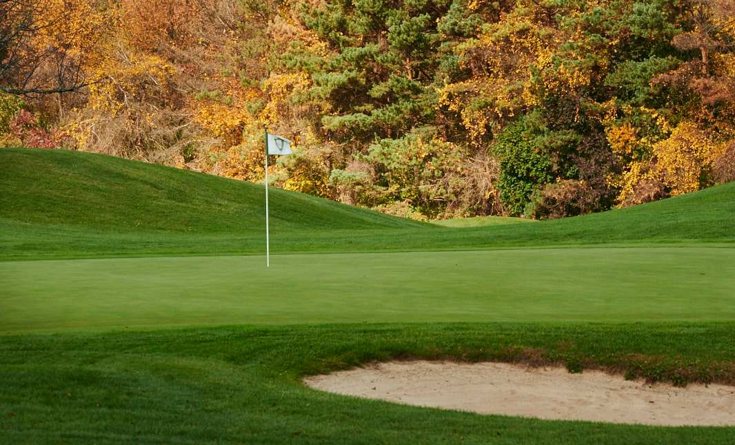 Fall foliage on the Centre Hills Golf course near Village at Canterbury - by S&A Homes in State College