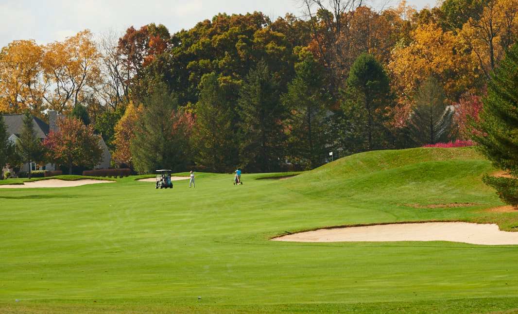 Fall foliage on the Centre Hills Golf course near Village at Canterbury - by S&A Homes in State College