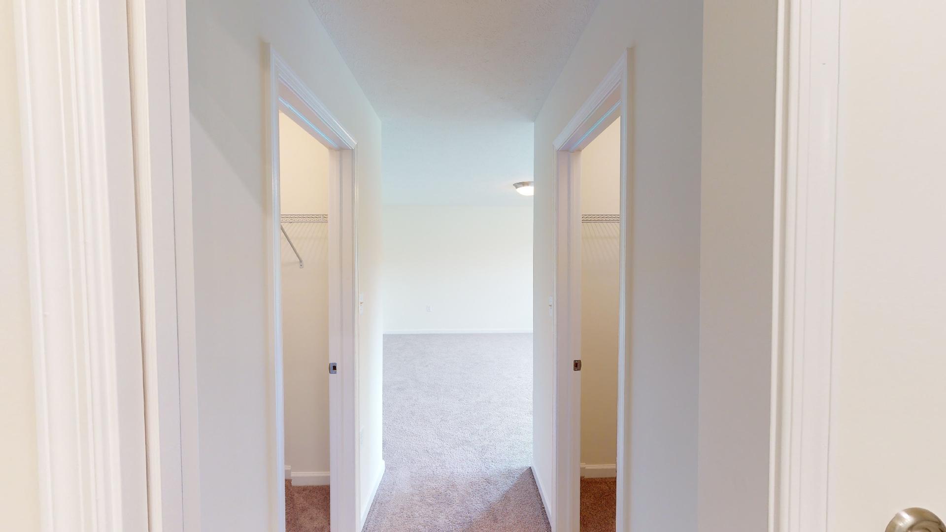 Hallway from owners bathroom to bedroom area