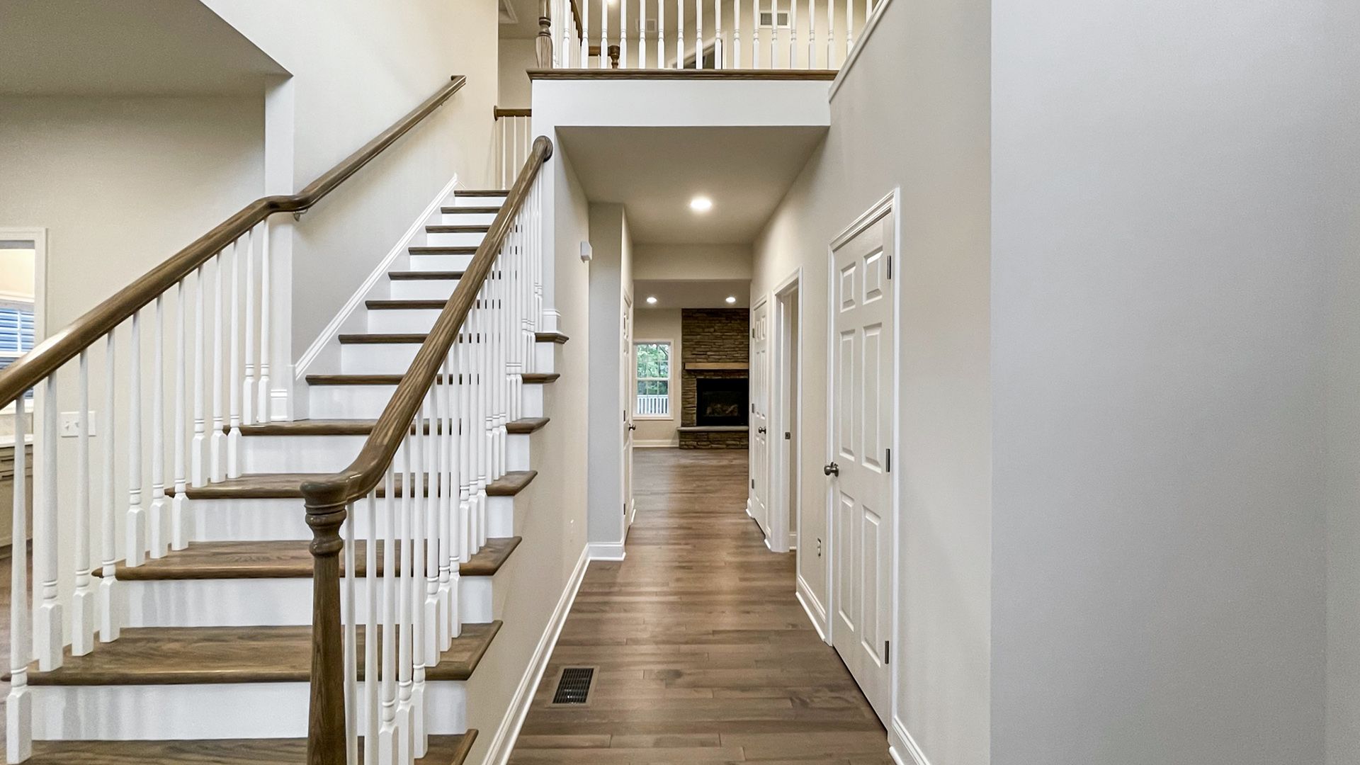 Foyer entry - stairs to 2nd level - oak treads with white risers
