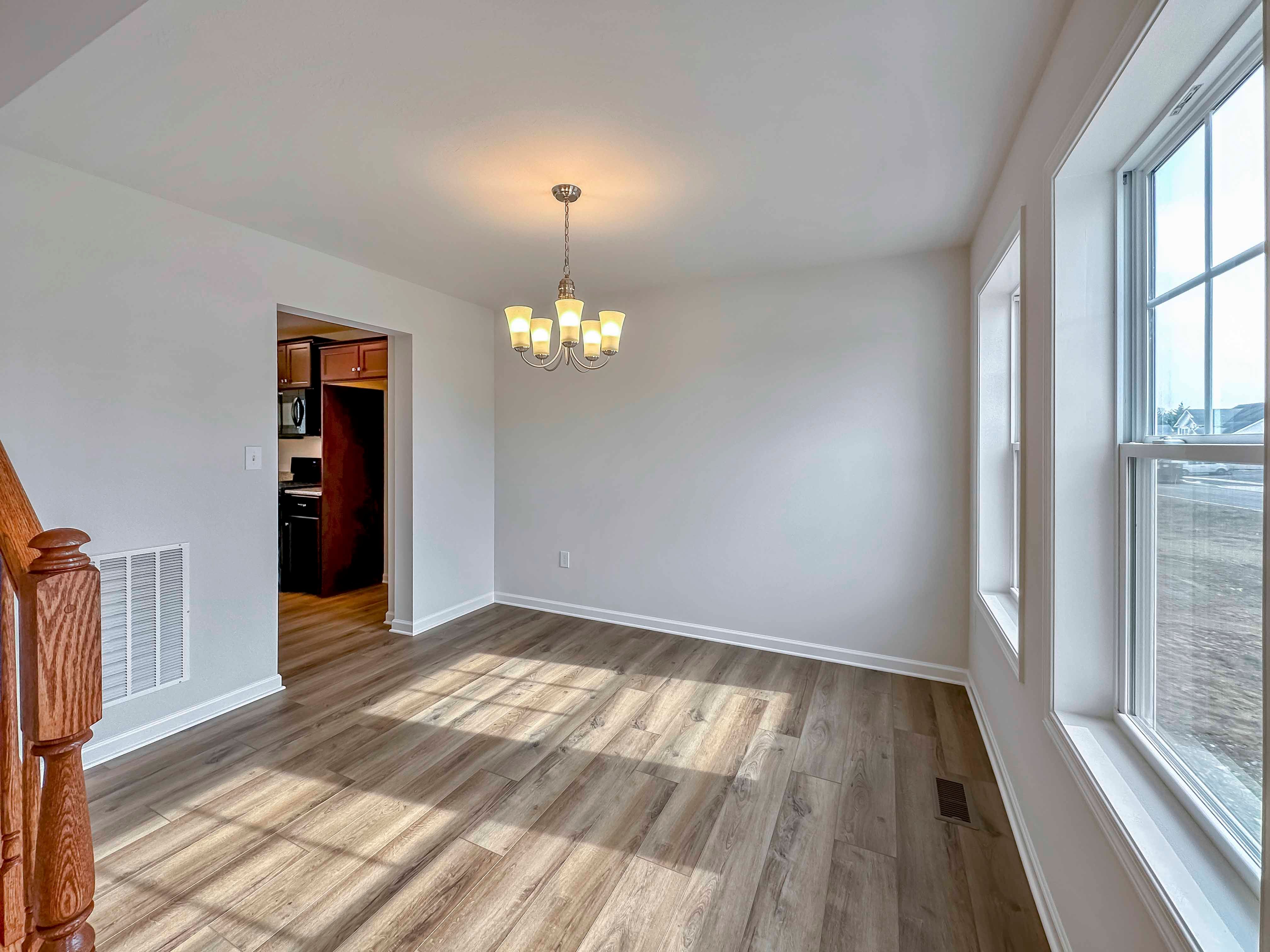 Dining room with hanging fixture