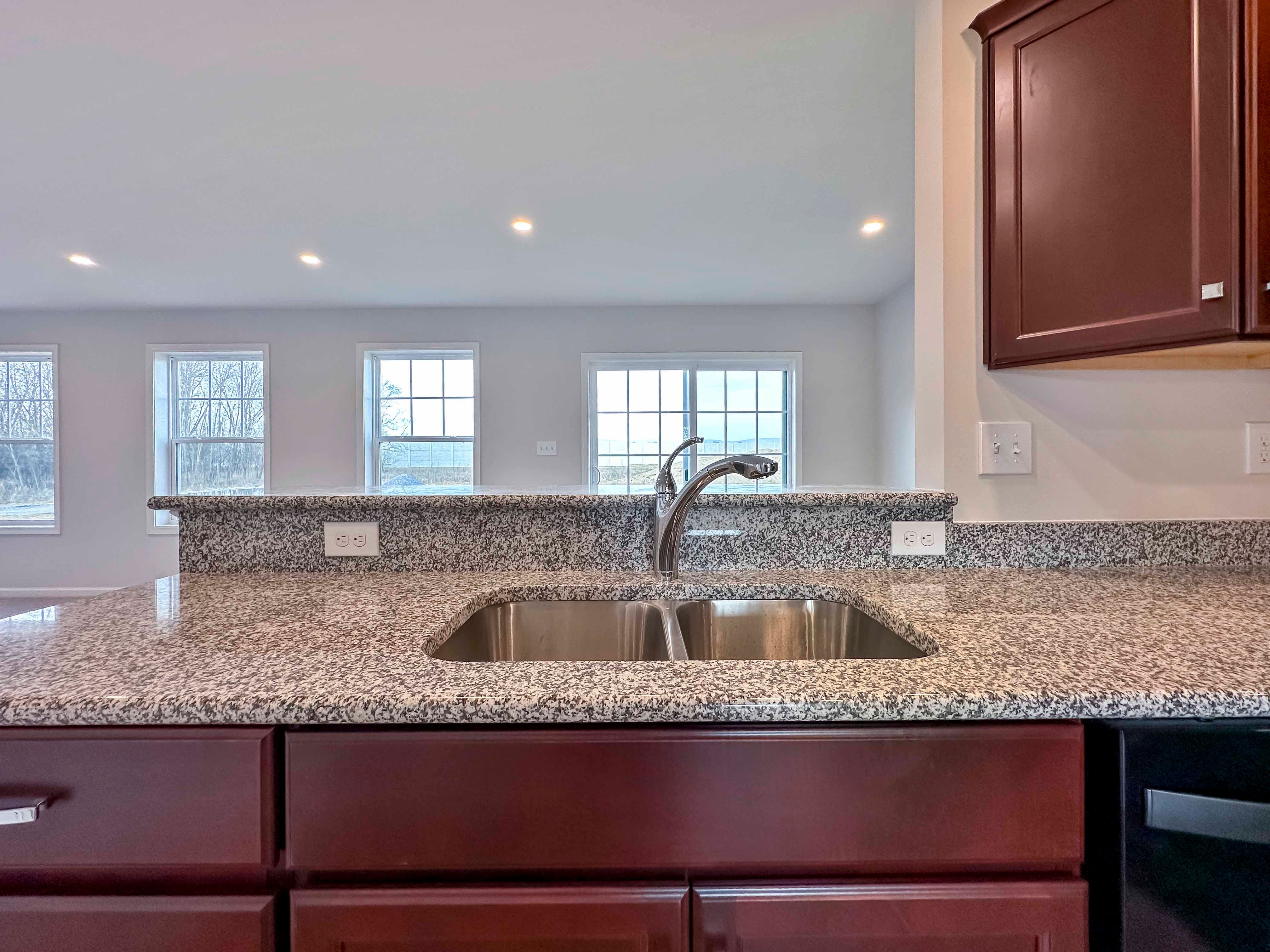 Undermount stainless steel kitchen sink with granite tops