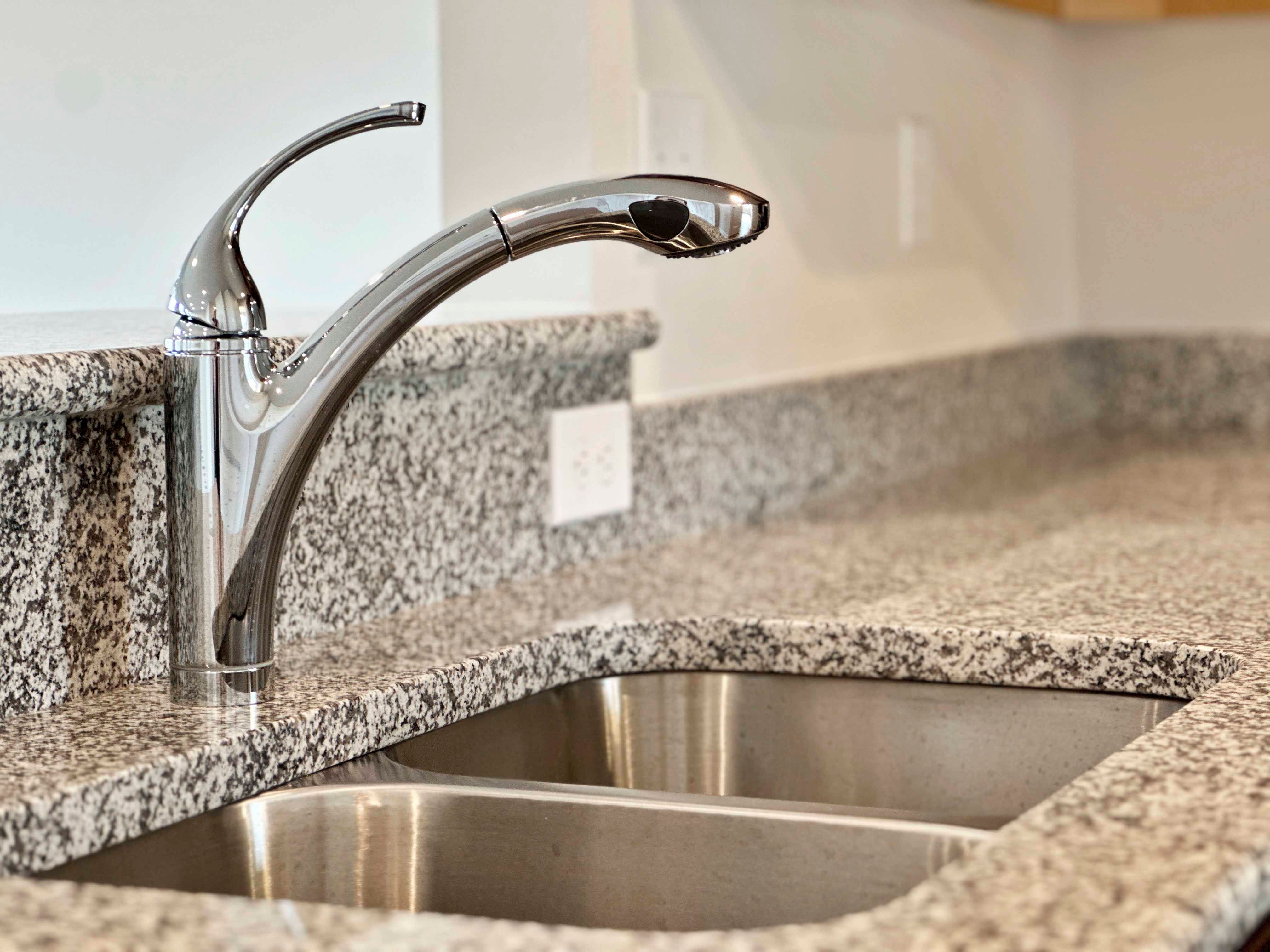 Undermount stainless steel kitchen sink with granite tops