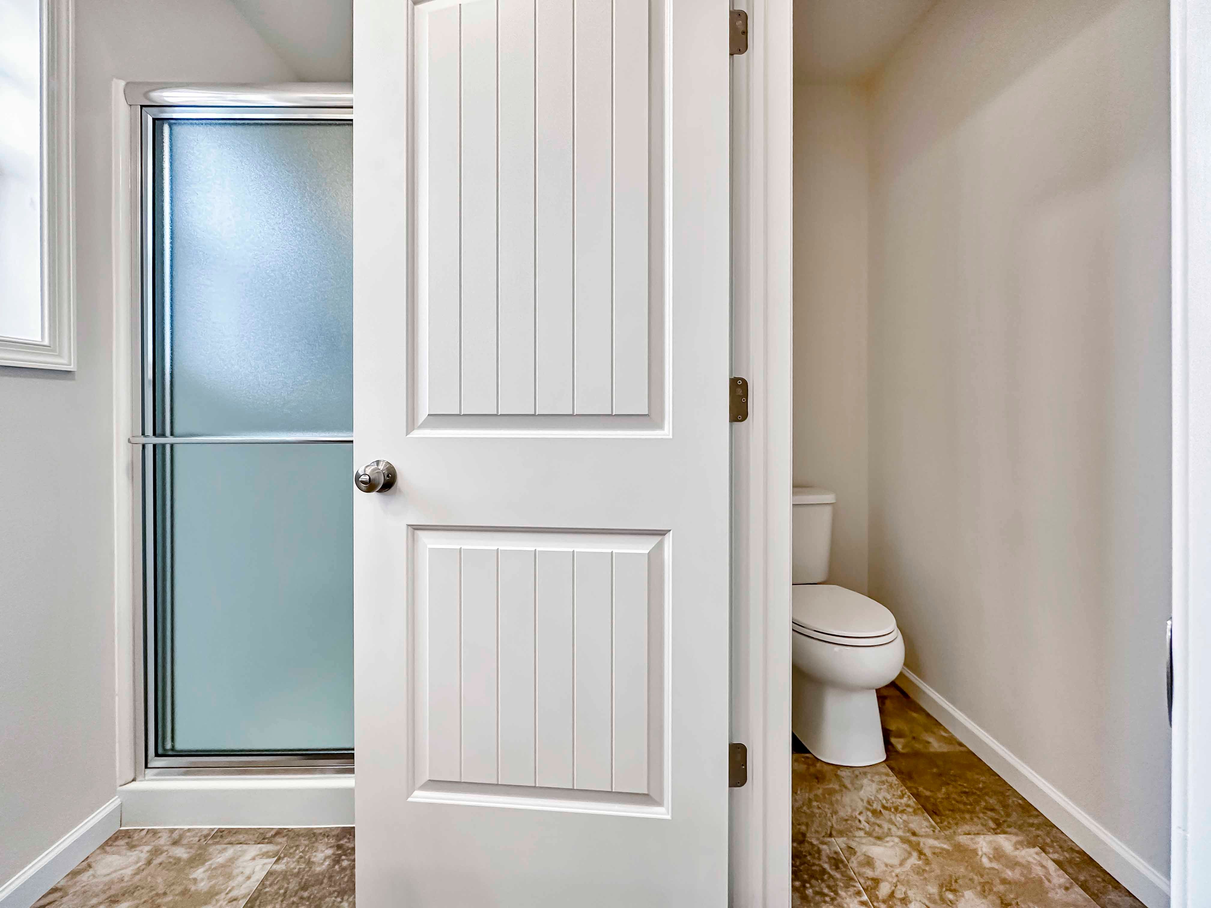 Doorway to water closet