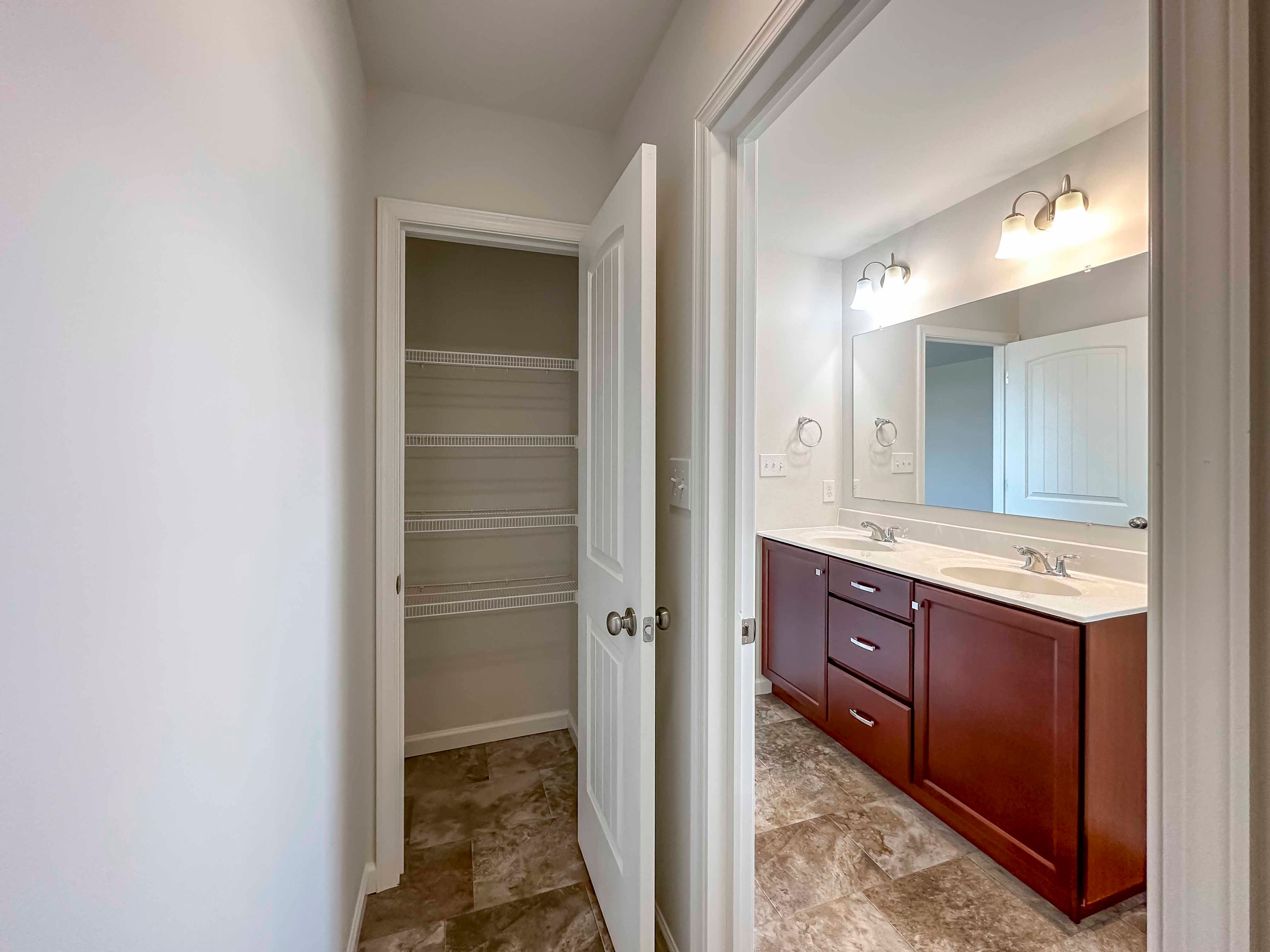 Linen closet with wire shelving