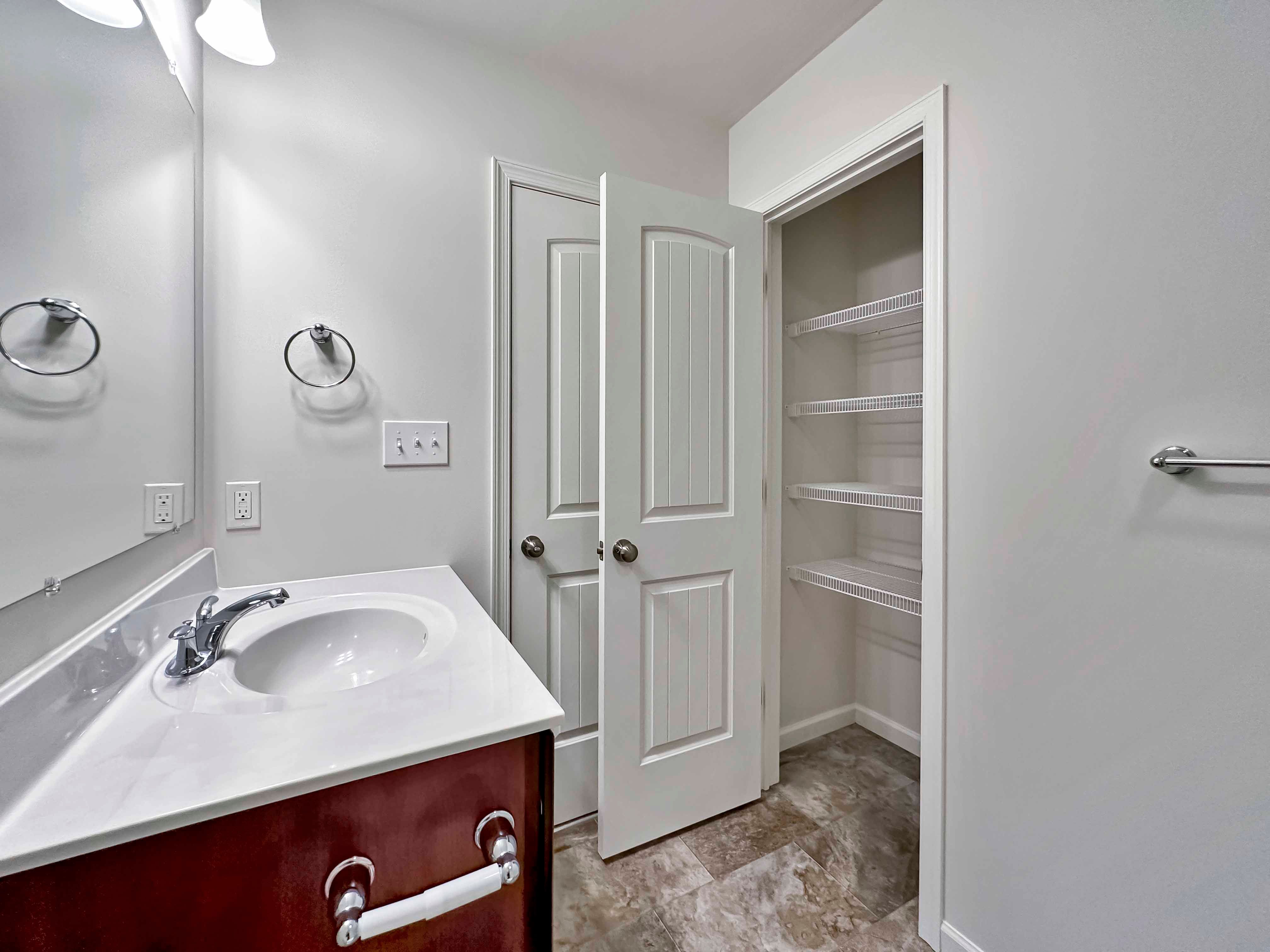 Bathroom with linen closet