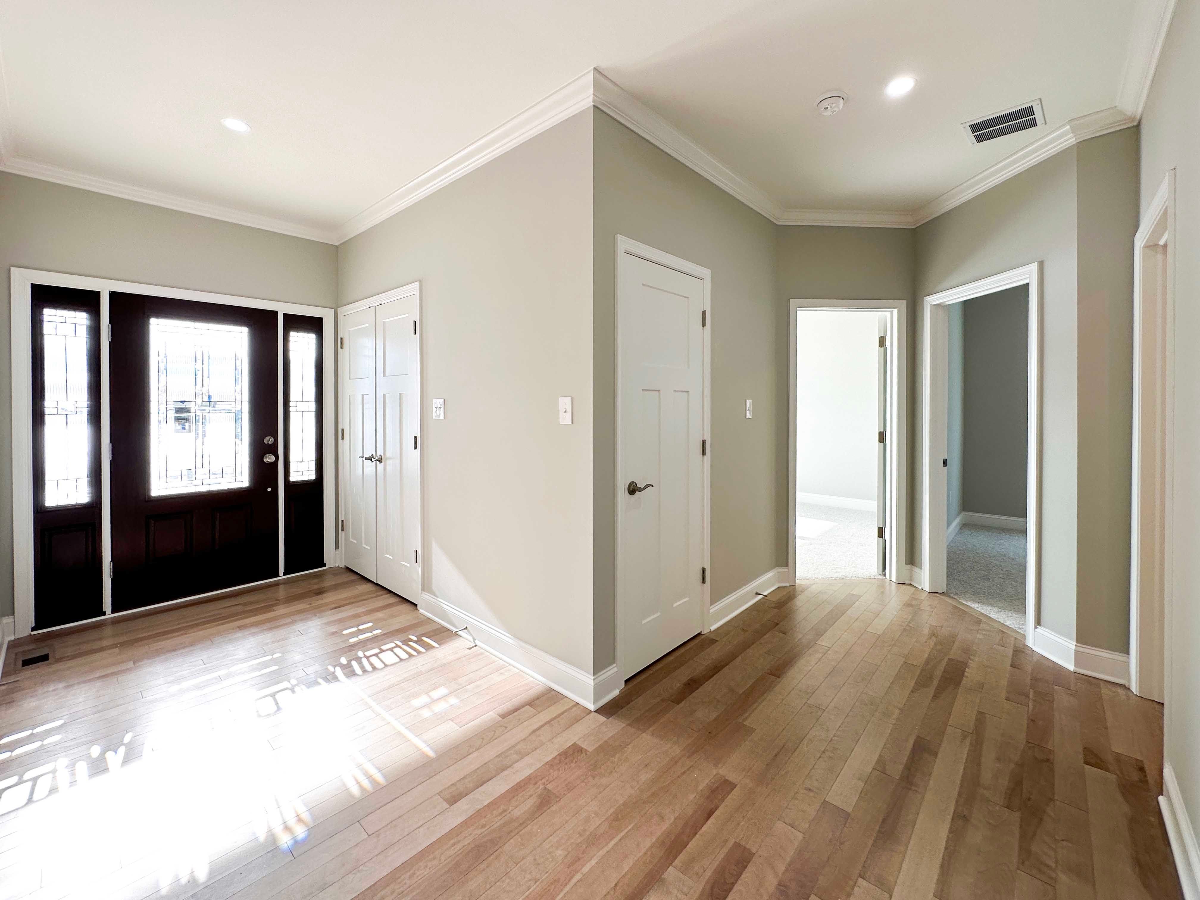 Foyer entry and hallway to bedrooms