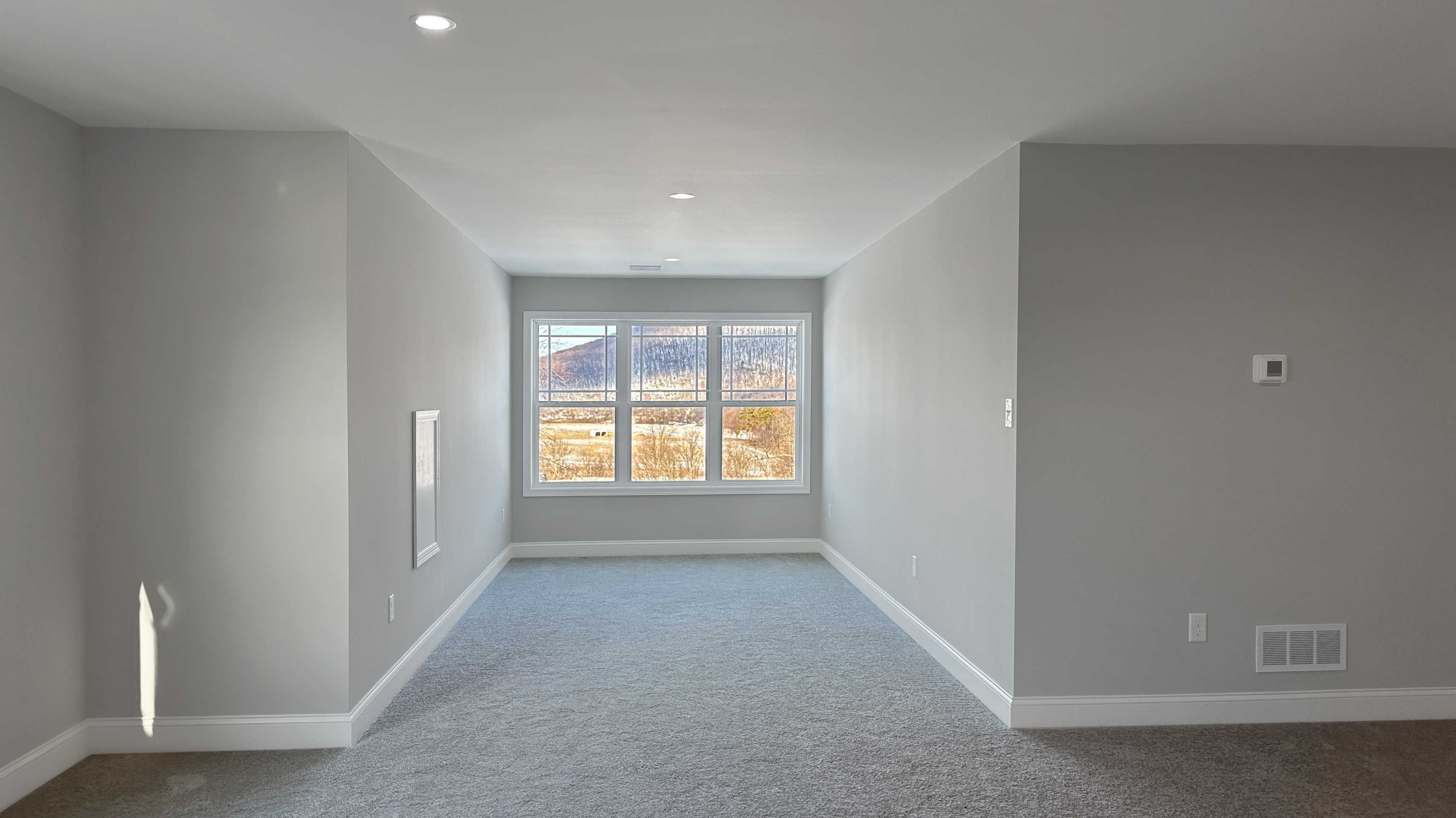 Dormer in loft with triple windows