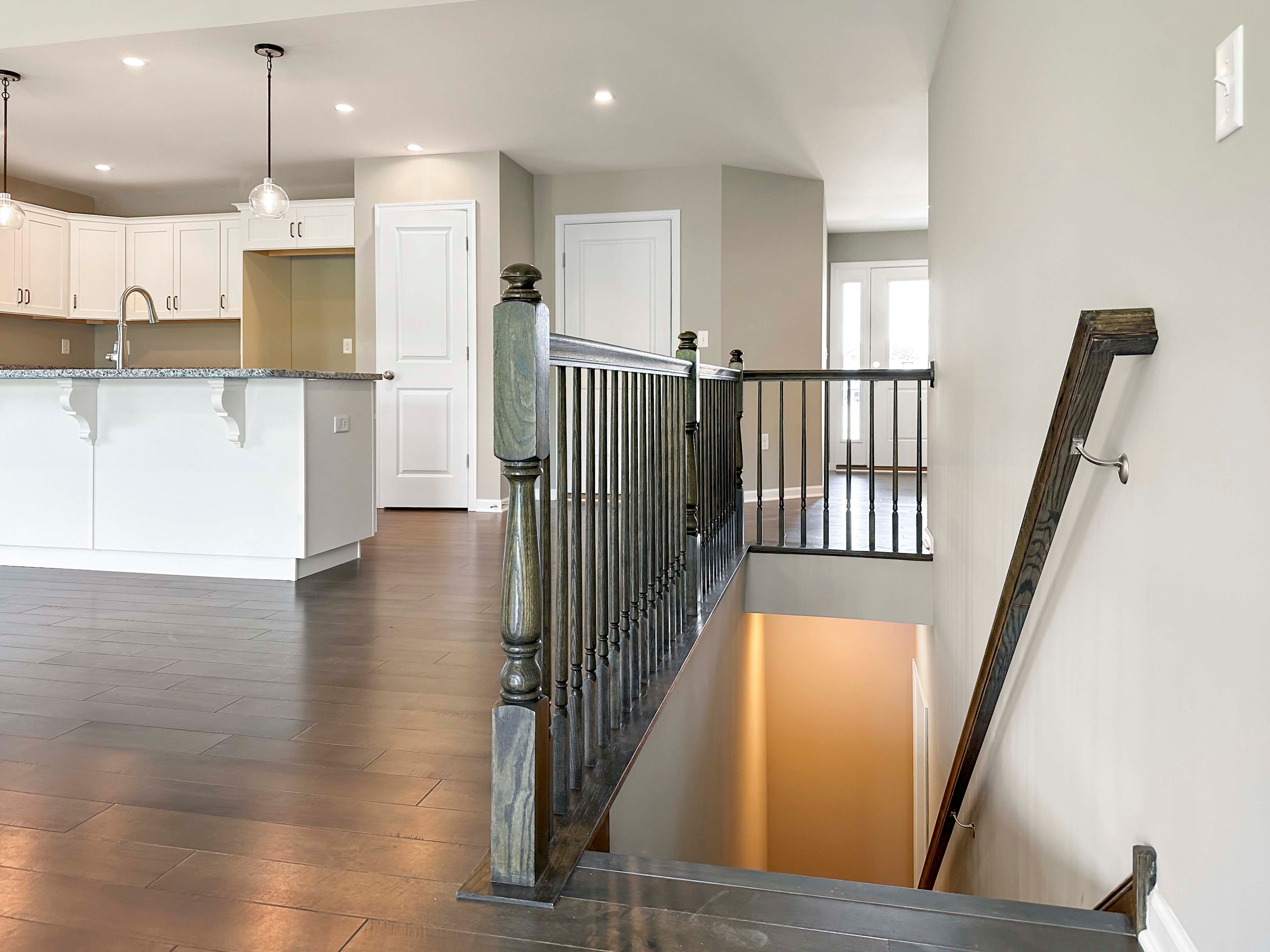 Stairs to basement from family room