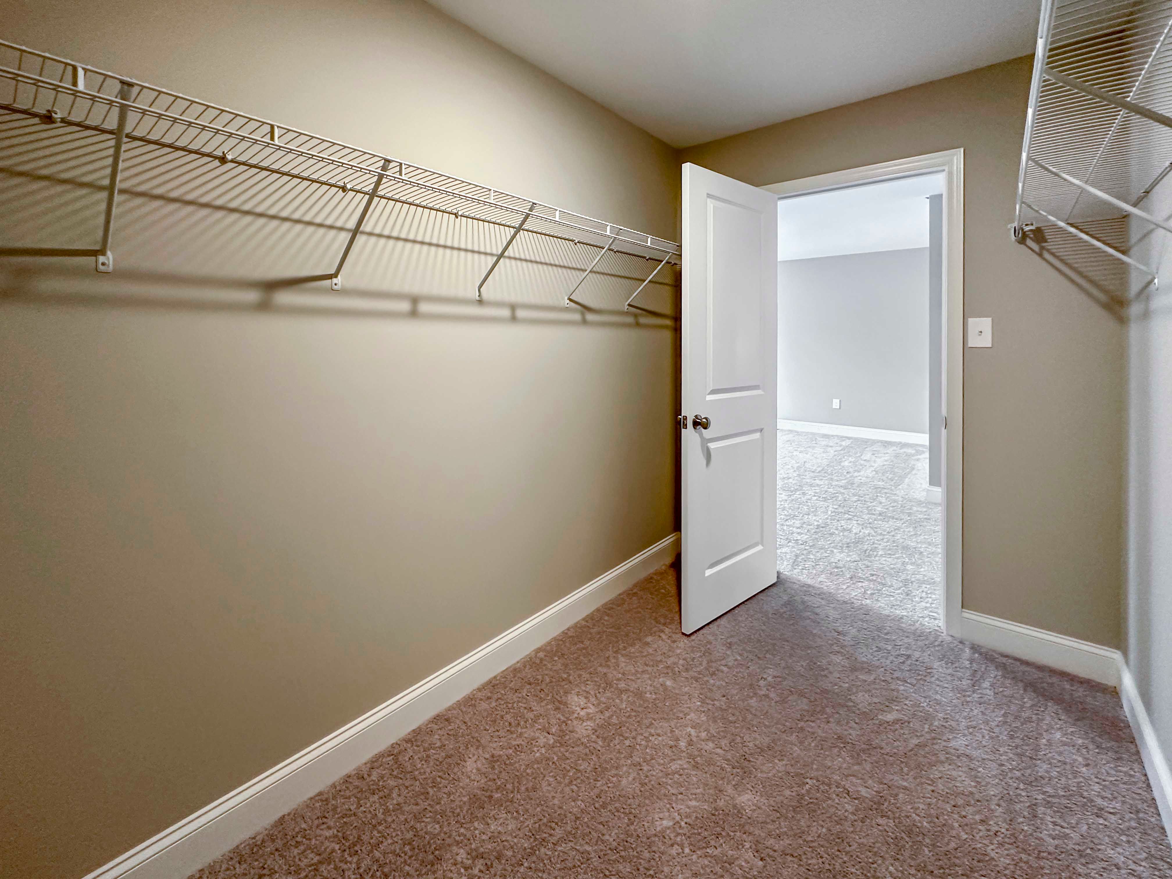 Owner's Closet - Walk-in closet with wire shelving