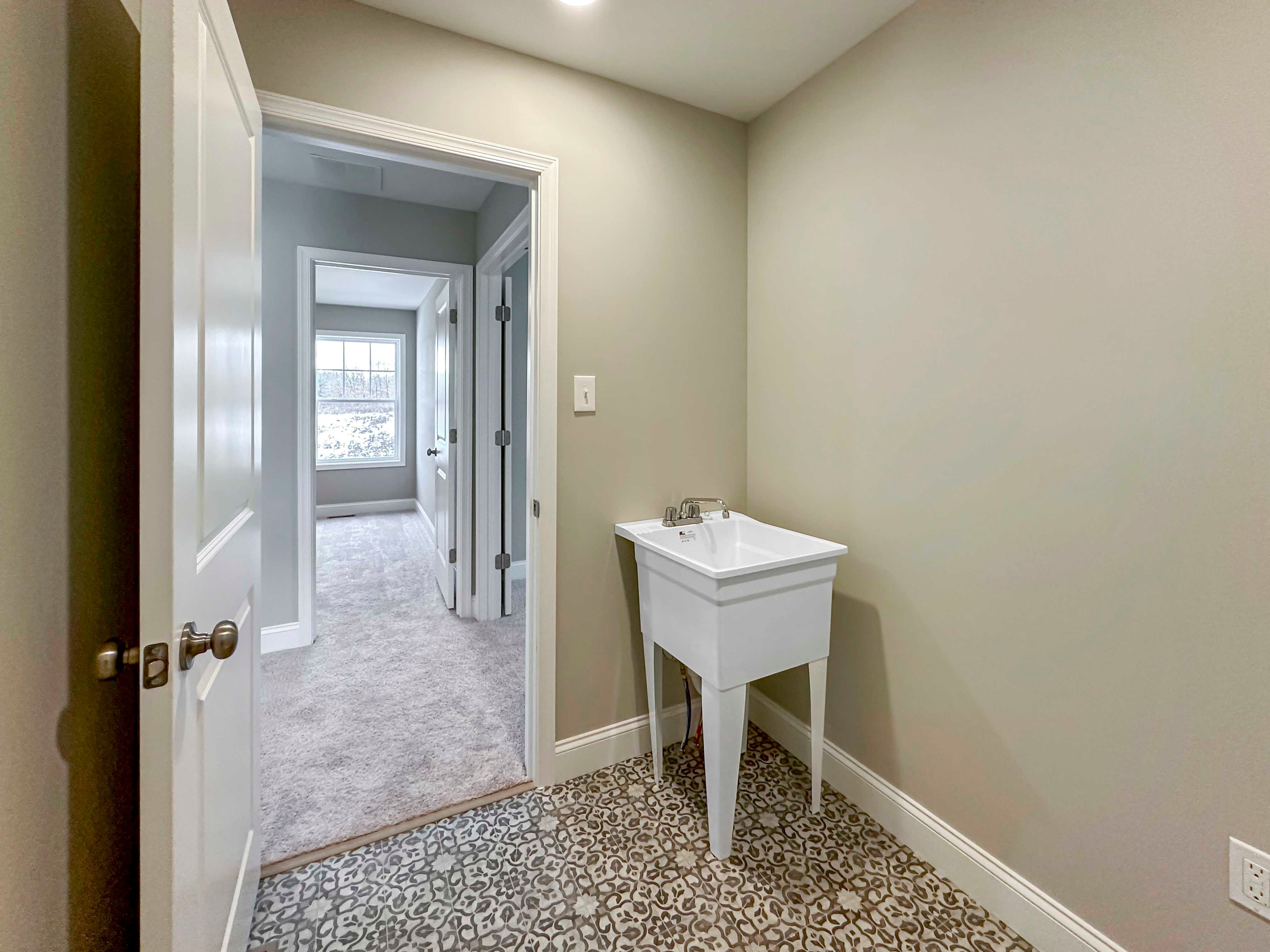 Laundry Room with wash basin