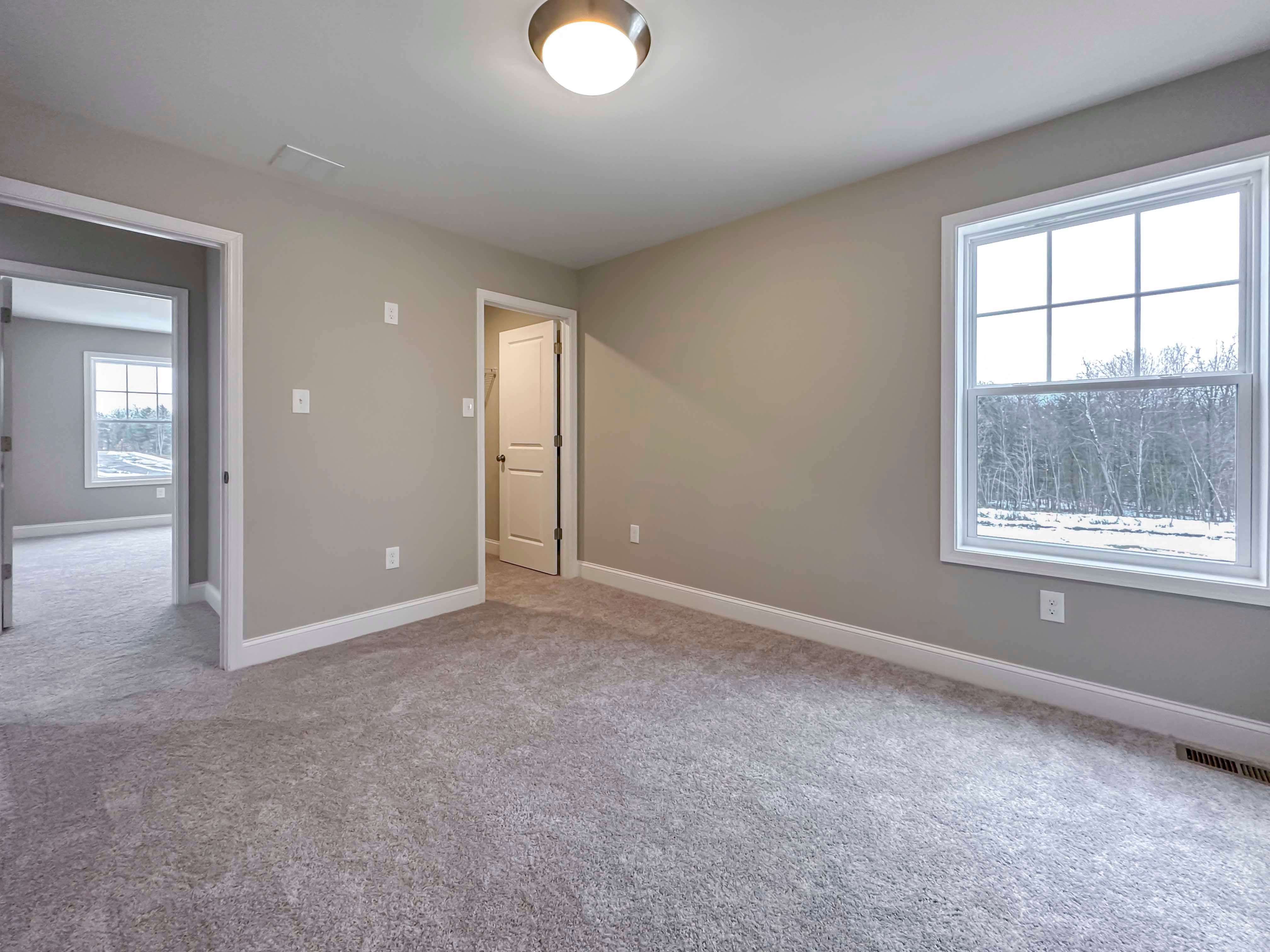 Bedroom 3 - Single-hung window and walk-in closet