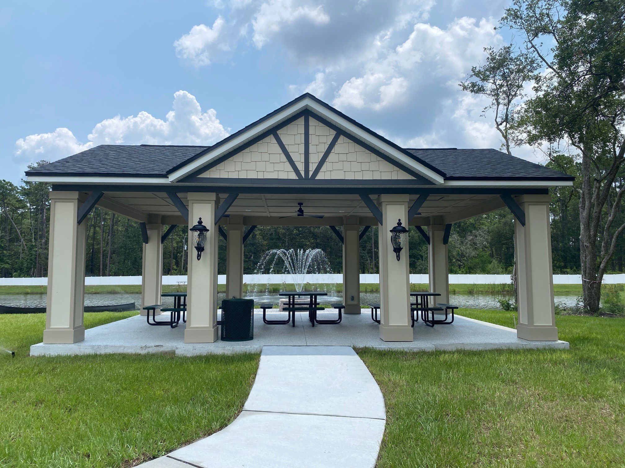 The community pavilion has lights for evening dining by the lake