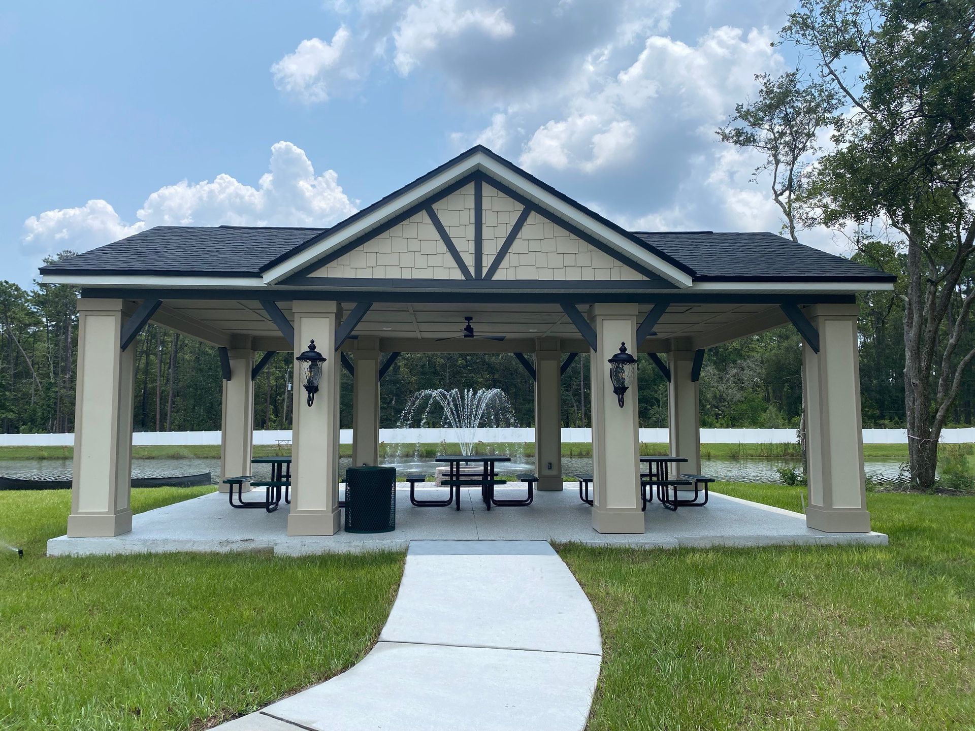 The community pavilion has lights for evening dining by the lake
