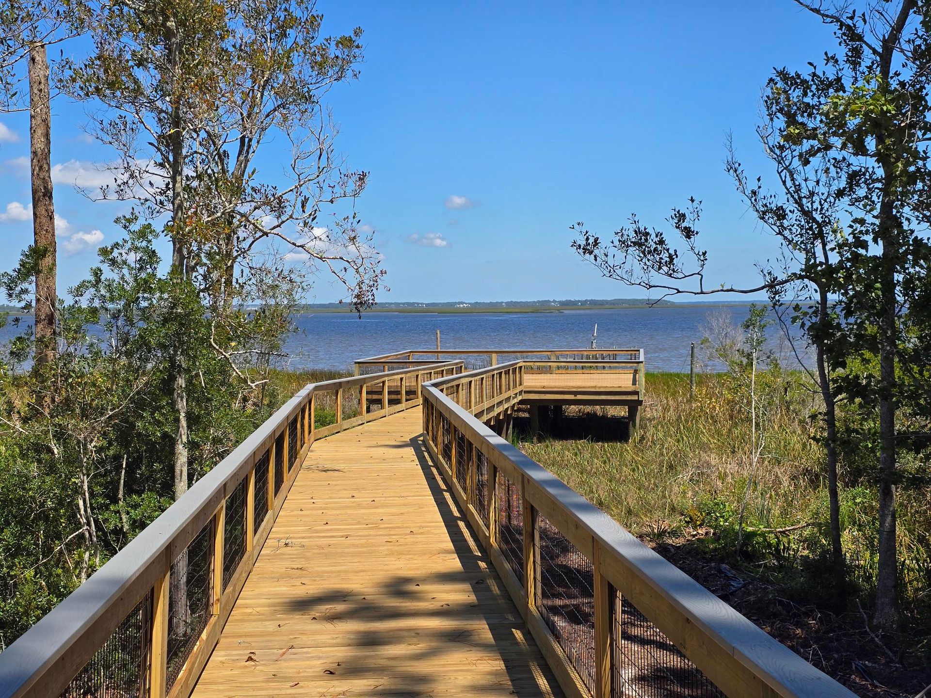 Riverfront community boardwalk and viewing vista 
