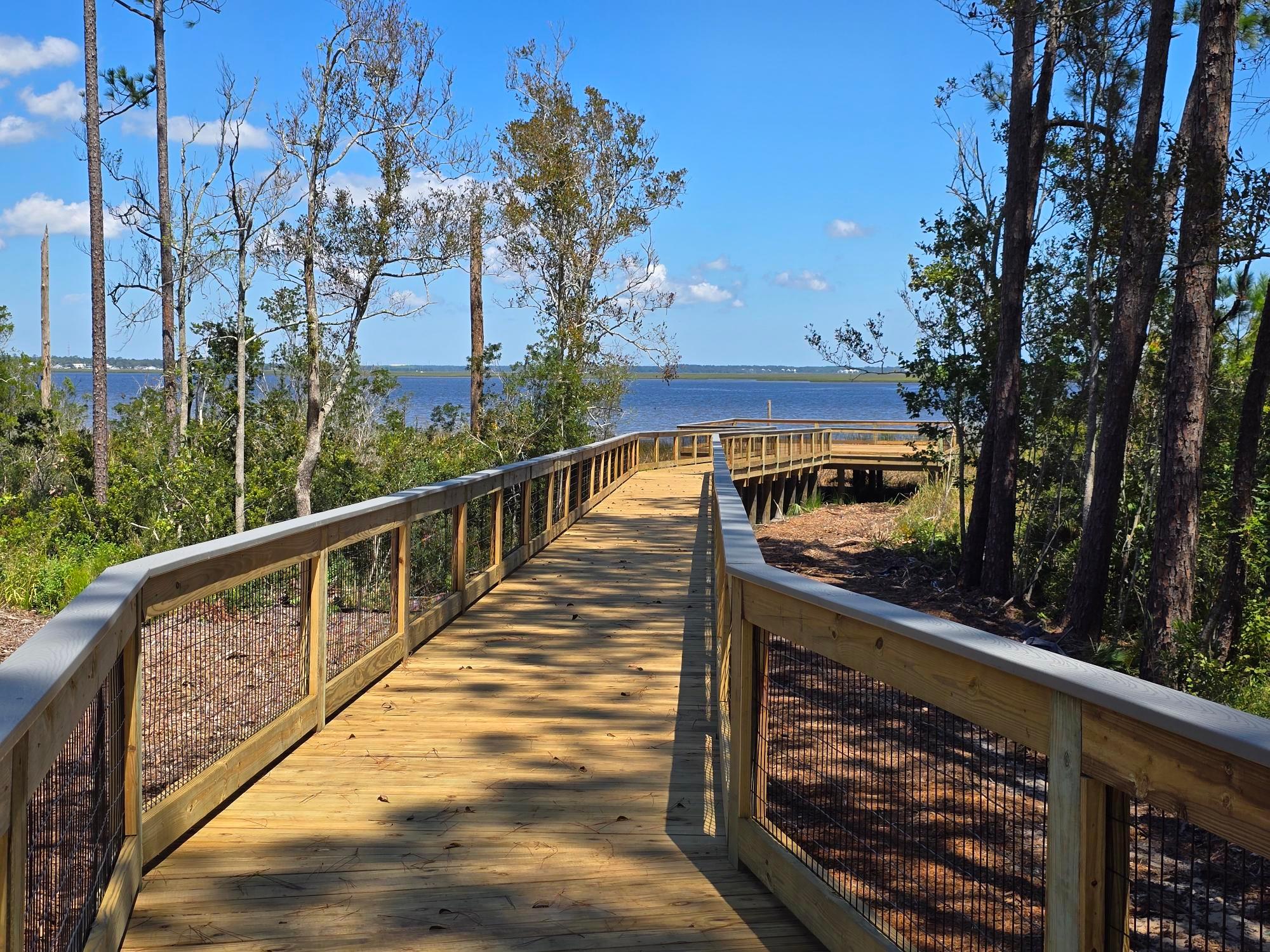 Riverfront community boardwalk and viewing vista 