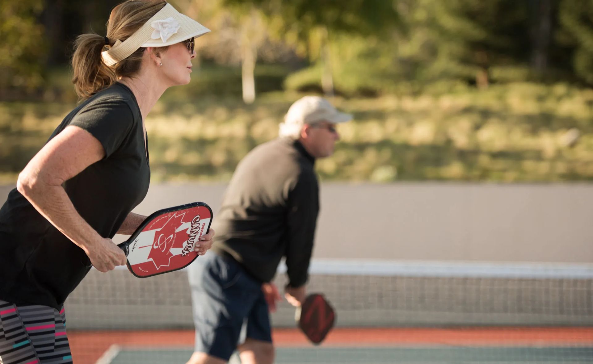 Trilogy Homeowners Playing Pickleball