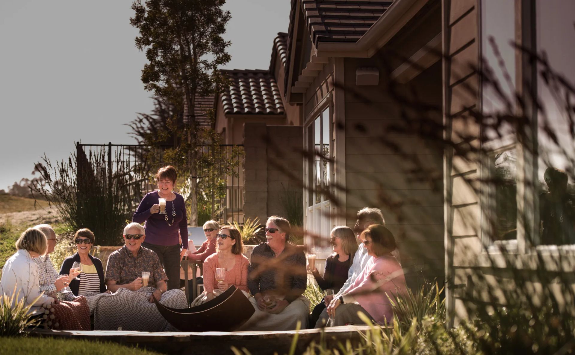 Homeowners Entertaining Outdoors