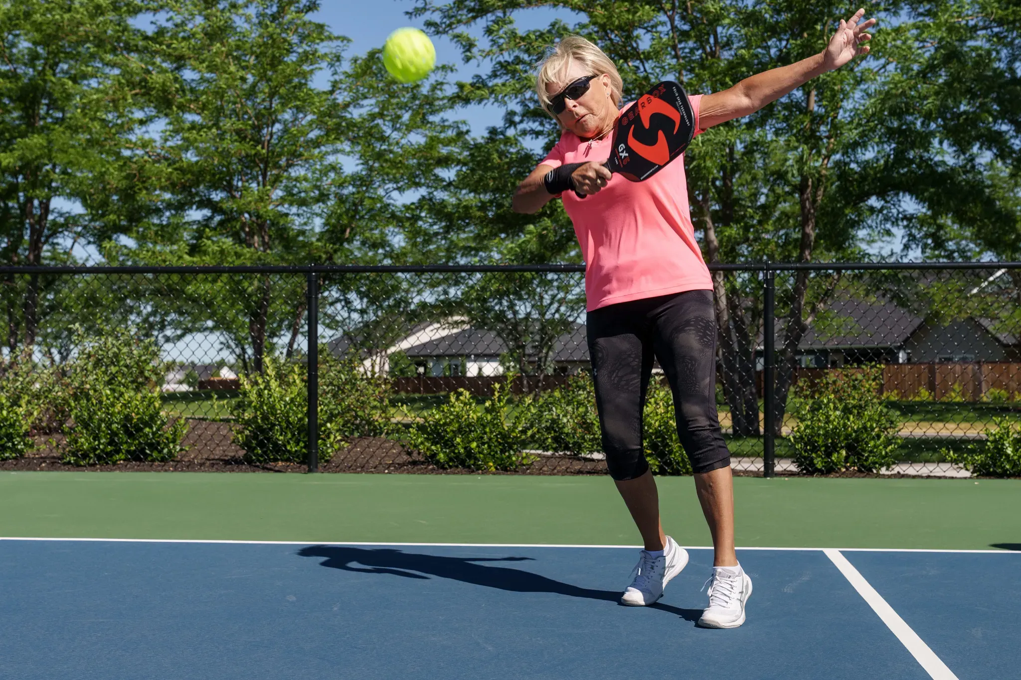 Lady Playing Pickleball