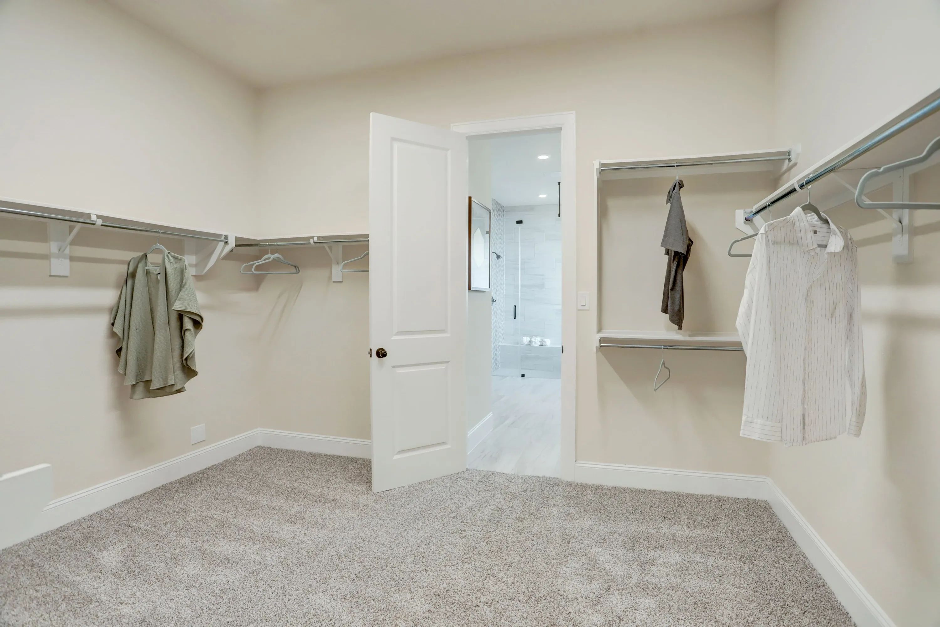 Plan 5051 primary closet - staged