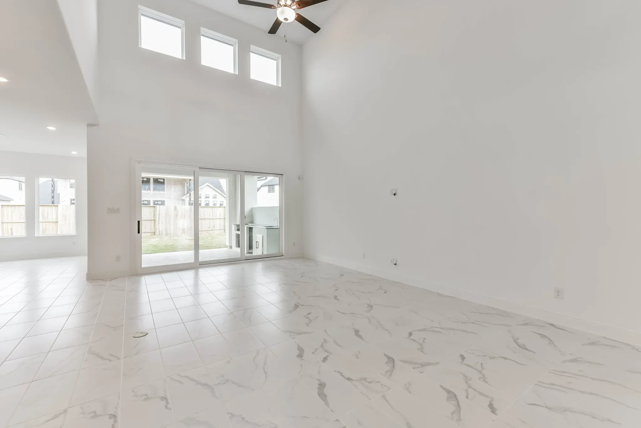 Plan 6040 great room w/ SS doors