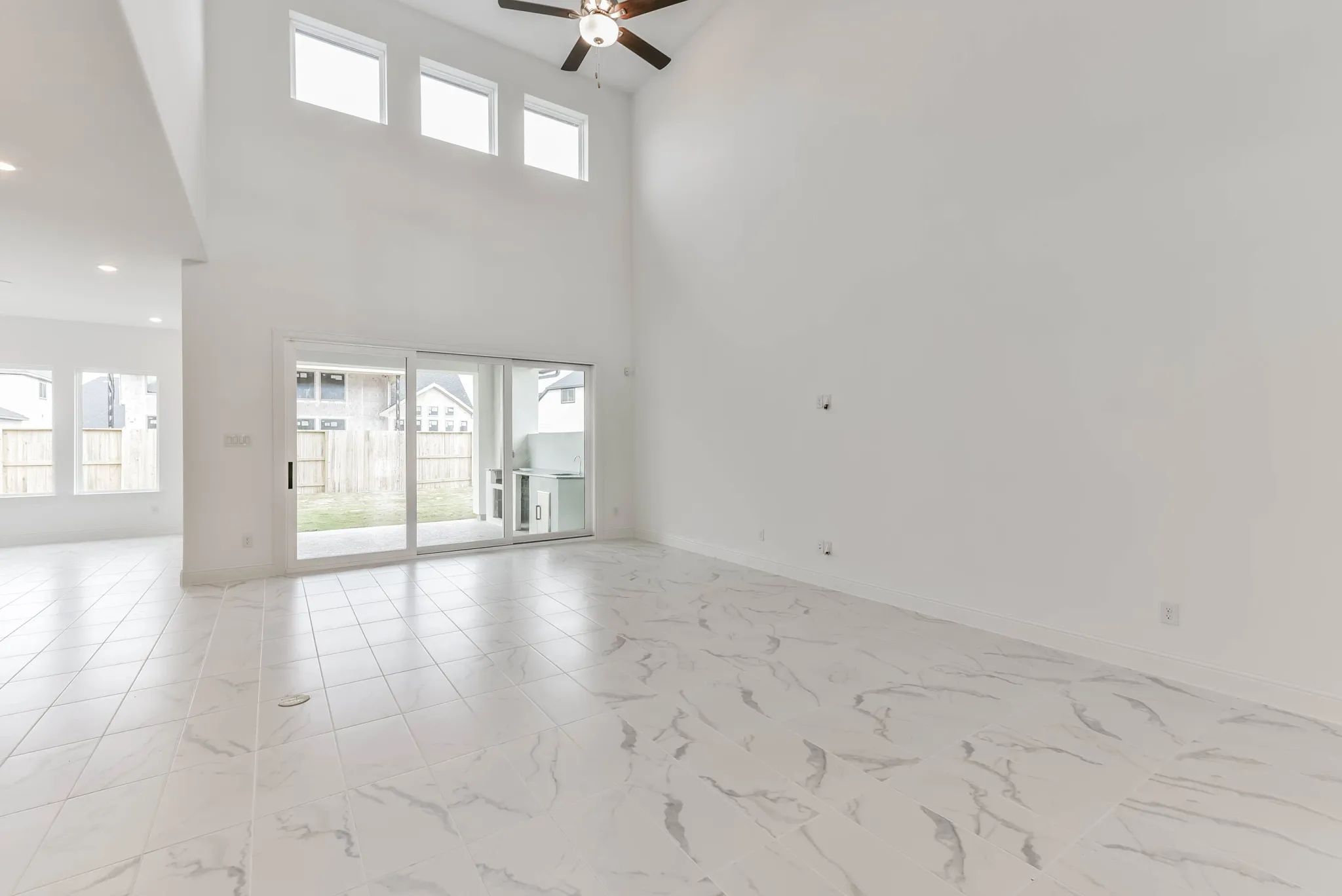 Plan 6040 great room w/ SS doors