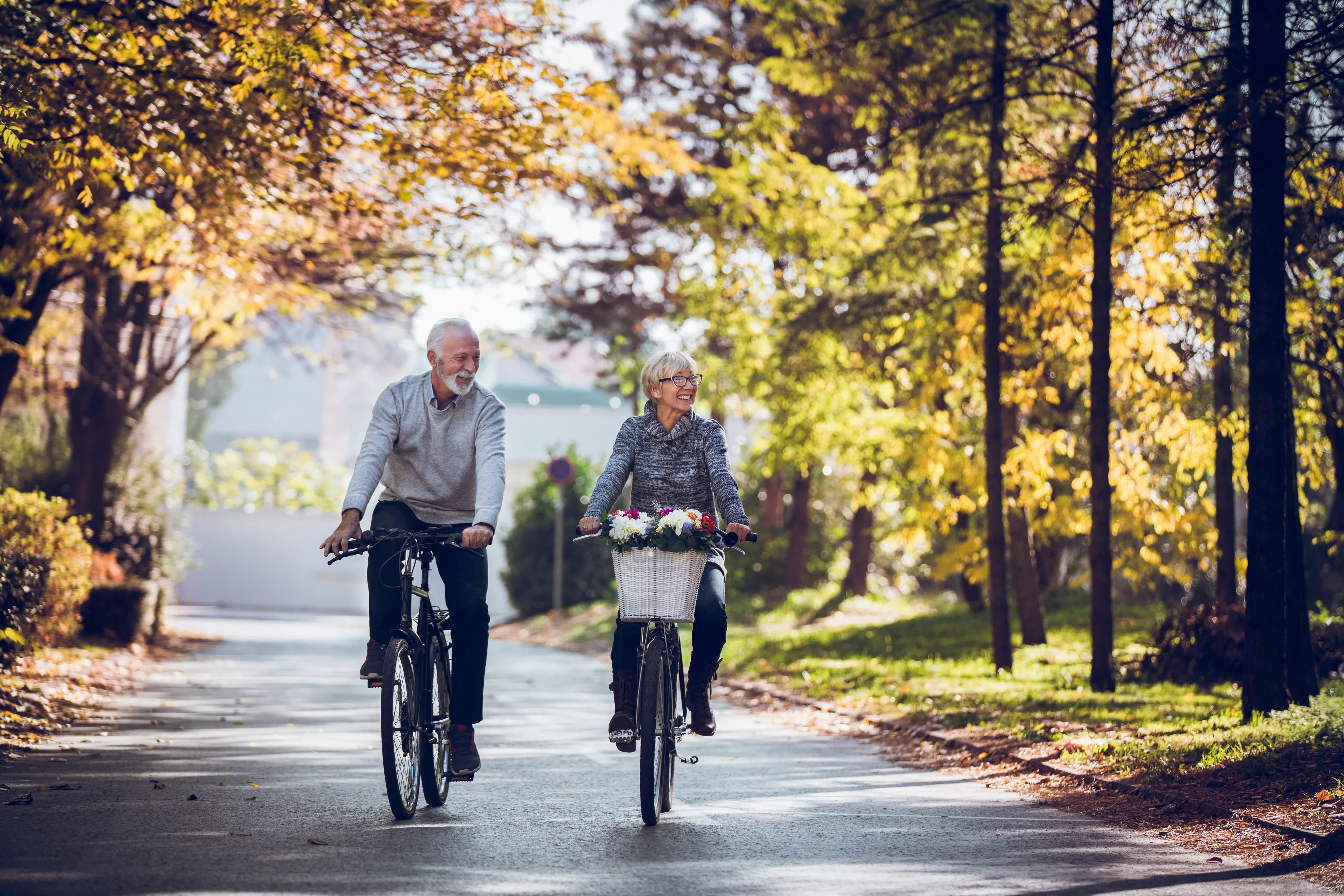 Couple Biking in a Neighborhood