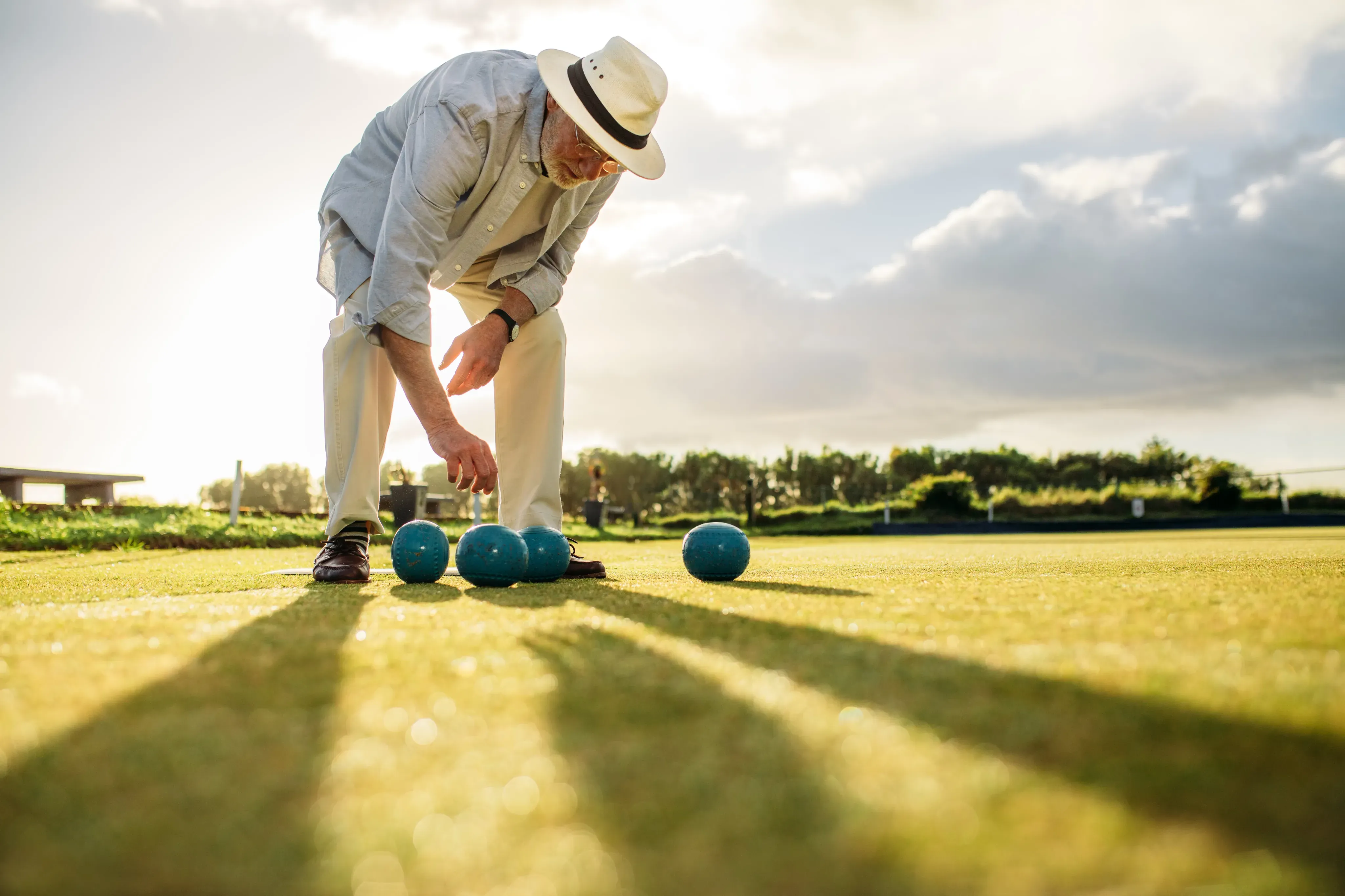 Man Playing Bocce