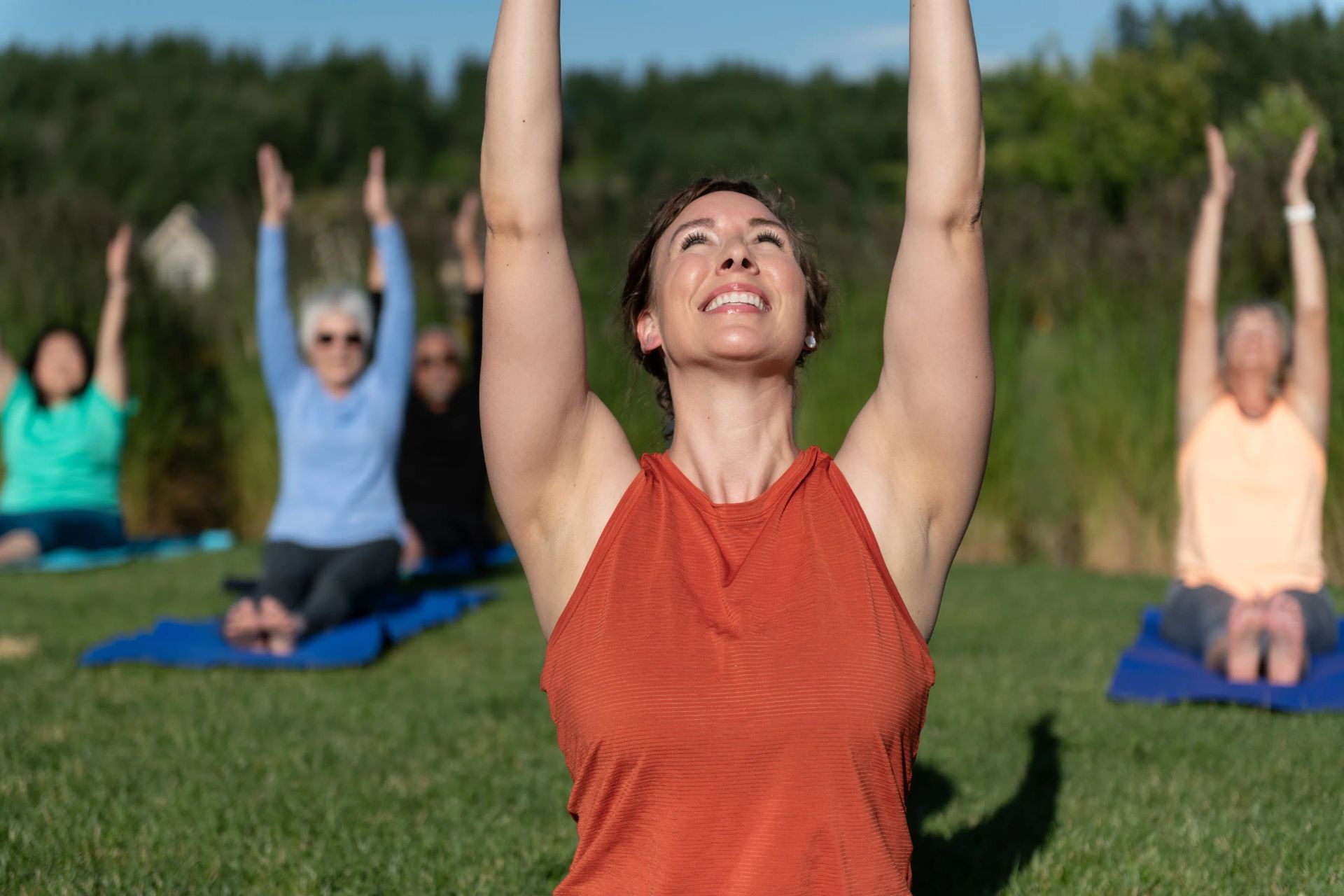 Trilogy Homeowner Members doing Yoga