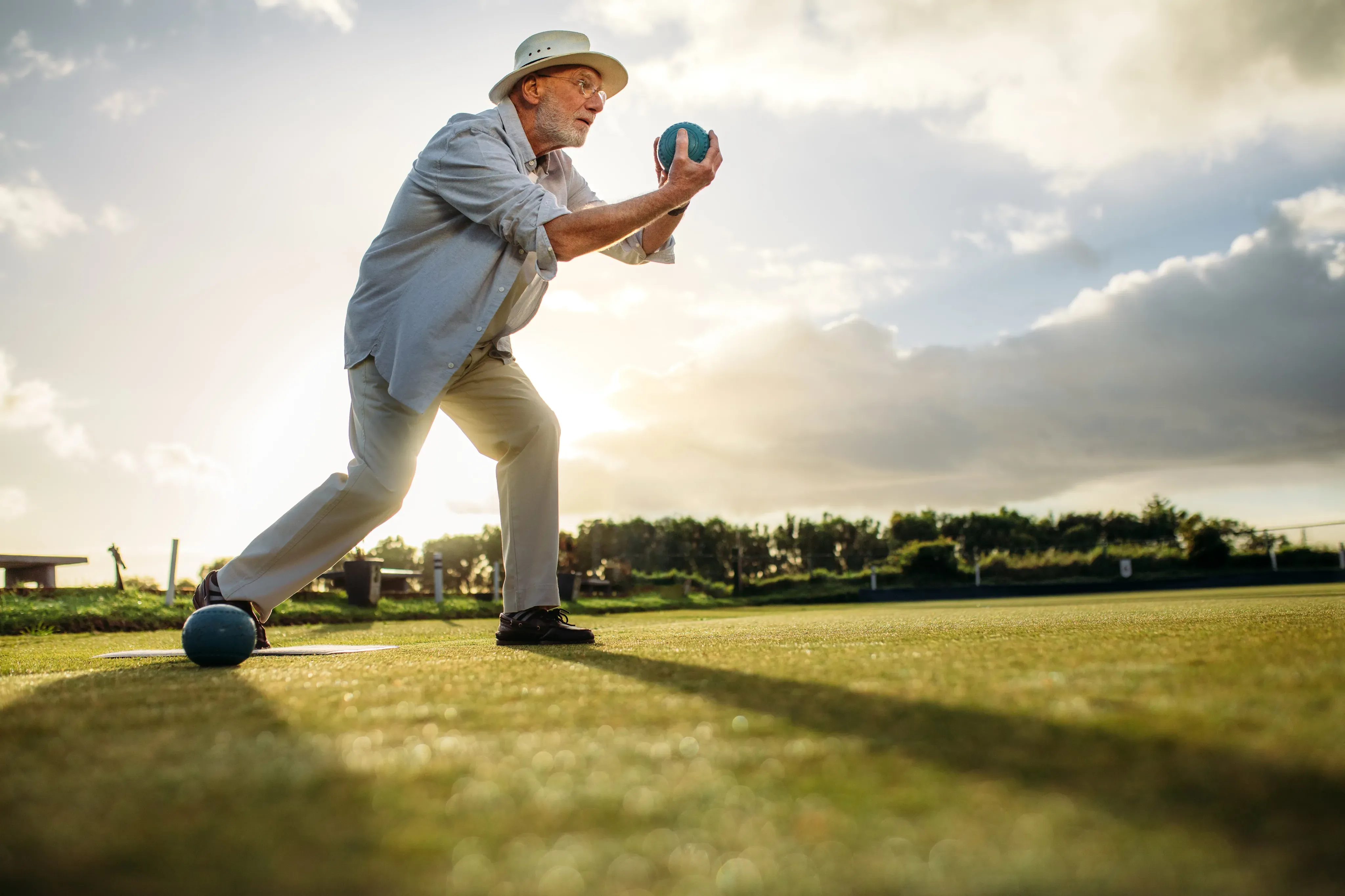 Man Playing Bocce