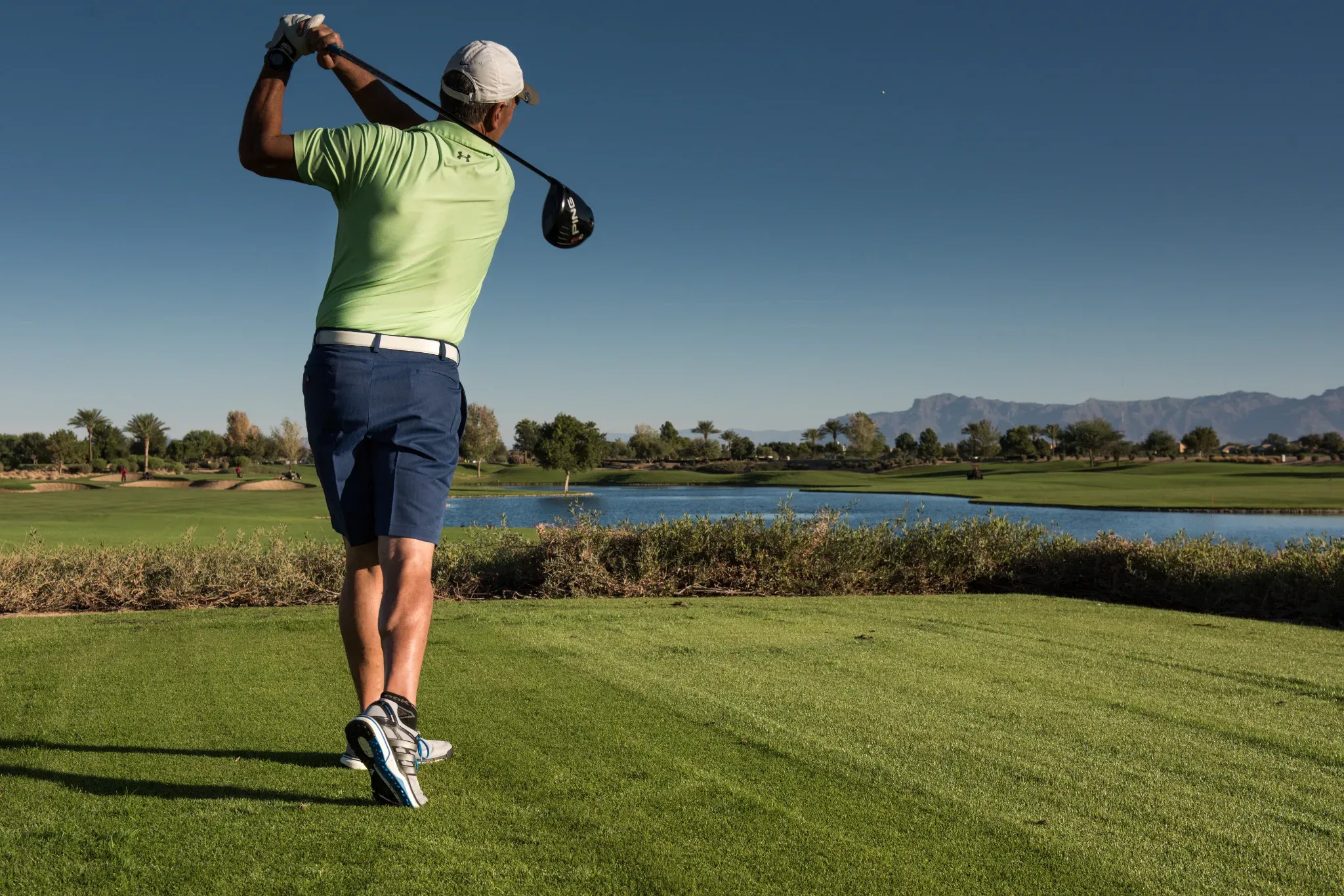 Trilogy Homeowner Golfing