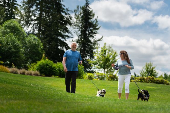 Trilogy Homeowner Members Walking Their Dogs