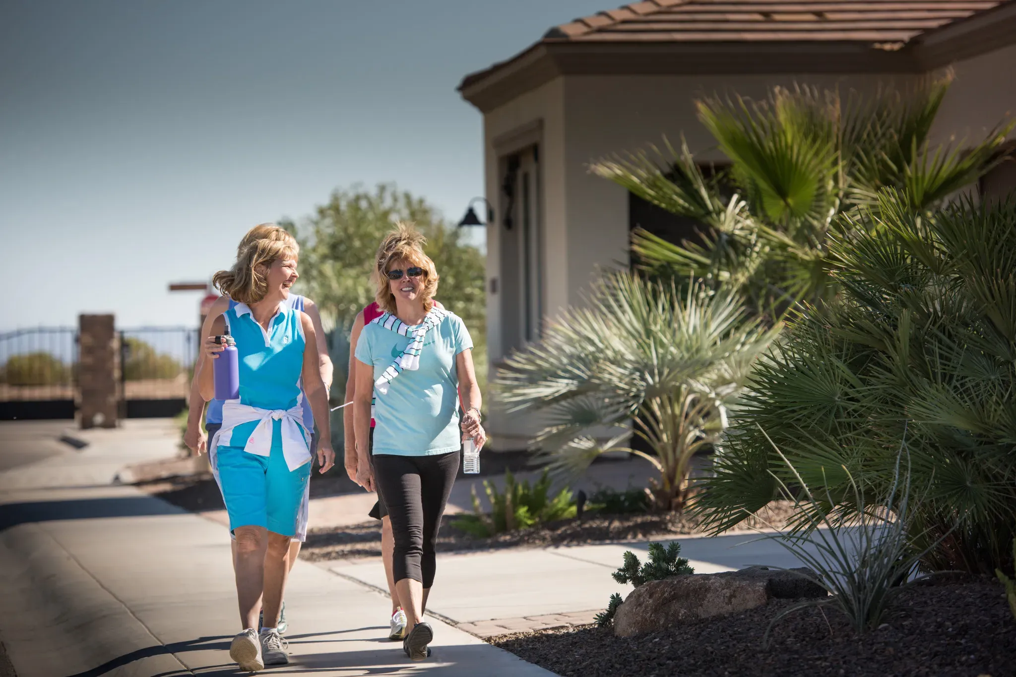 Trilogy Homeowners Taking a Walk