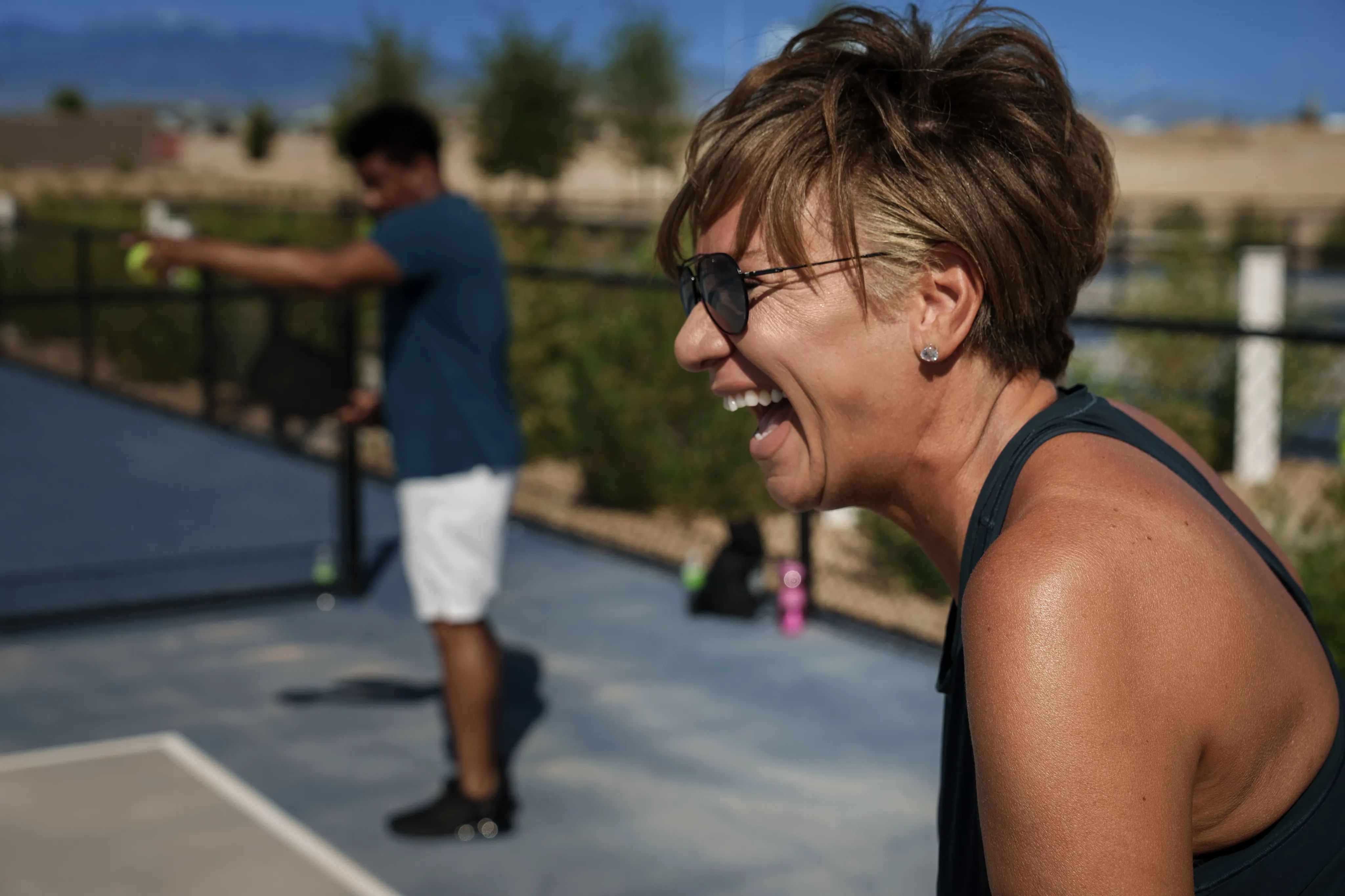 Trilogy Homeowner Playing Pickle Ball