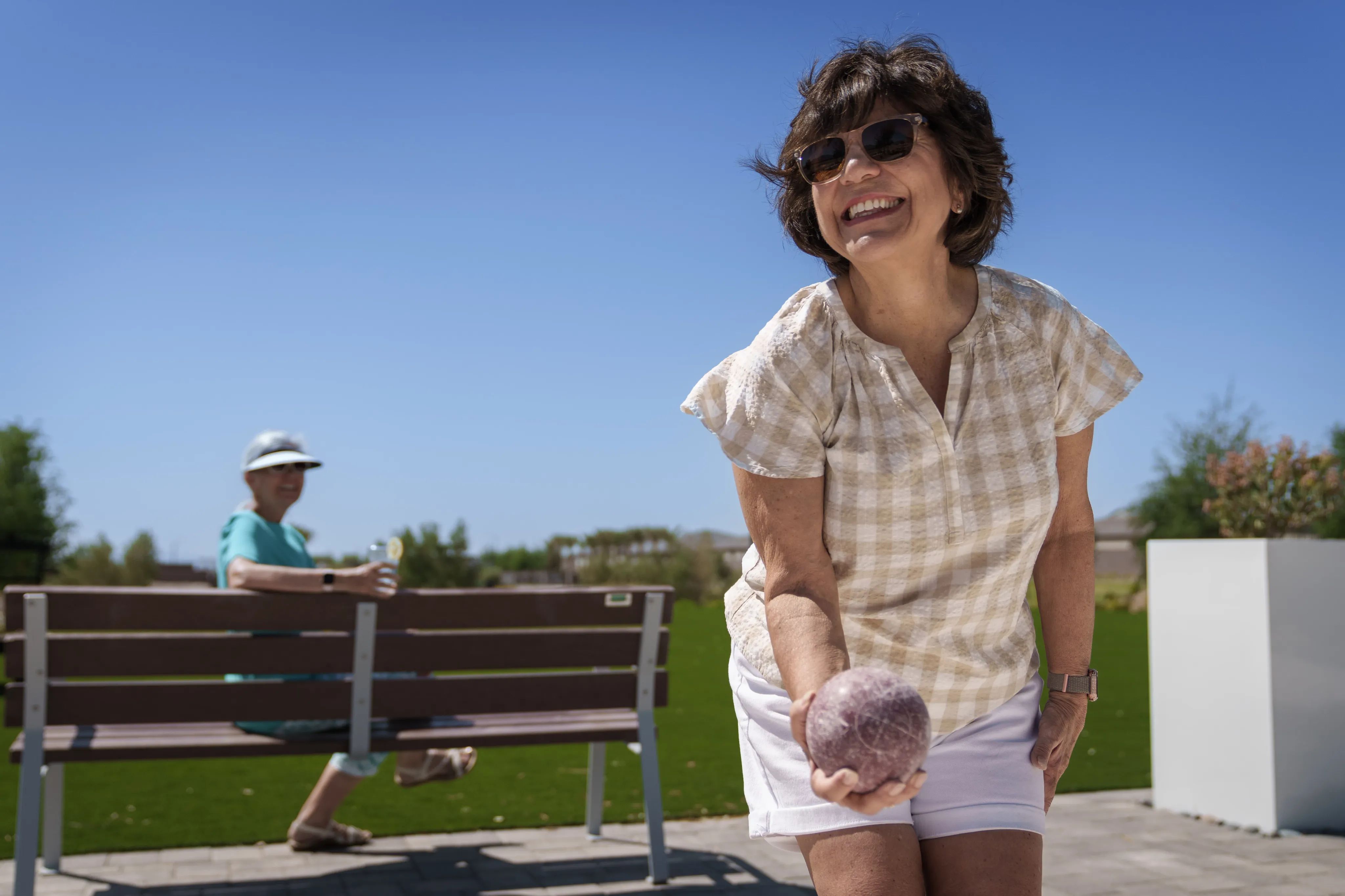 Trilogy Homeowner Playing Bocce Ball