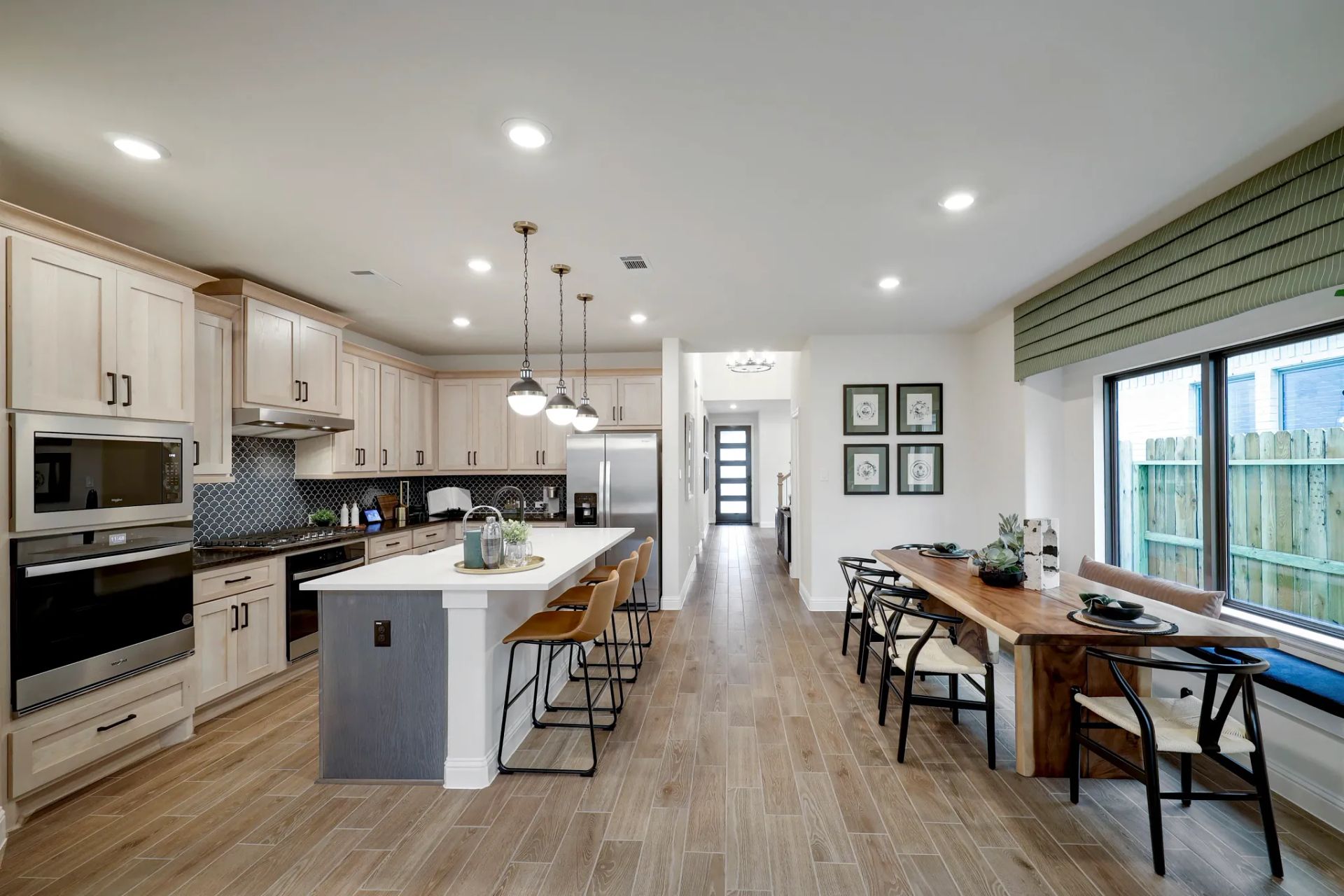Plan 3059 kitchen/dining - staged