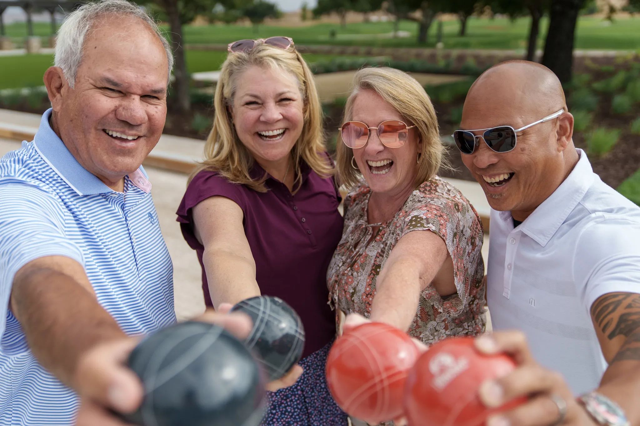 Trilogy Homeowners Playing Bocce