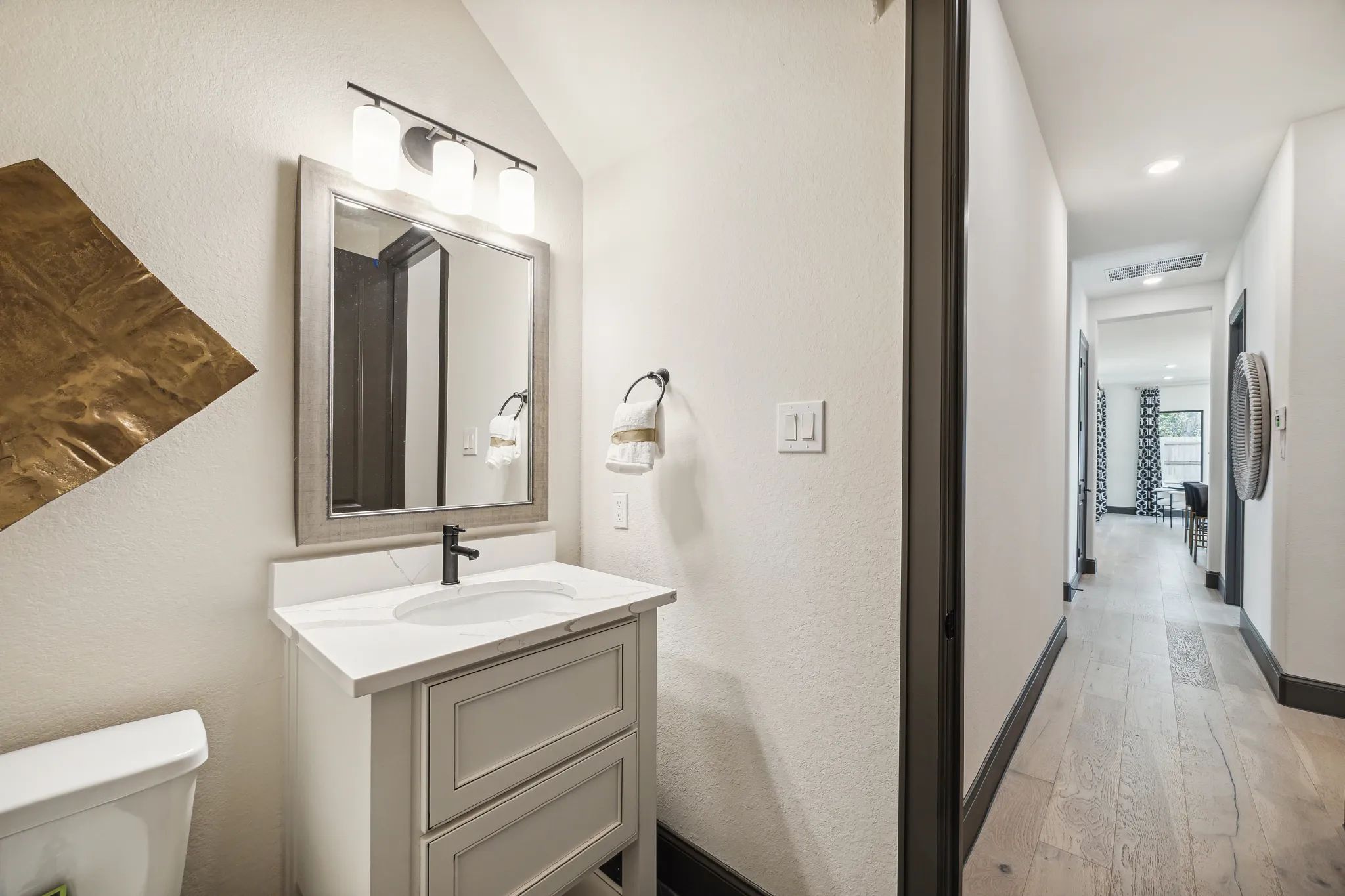 Plan 6020 downstairs powder room - staged