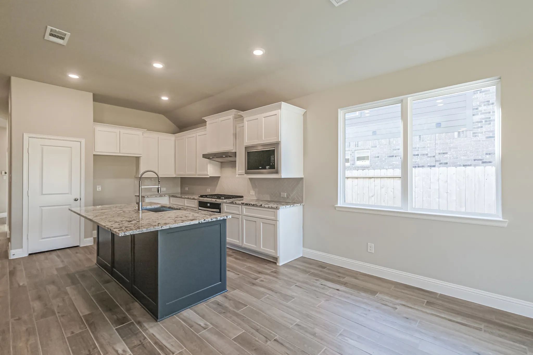 Plan 3029 kitchen-dining - look may vary