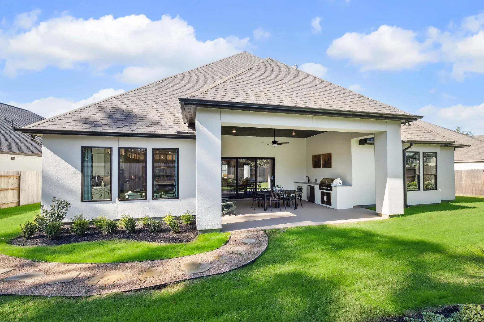 Plan 6020 model at Evergreen - backyard