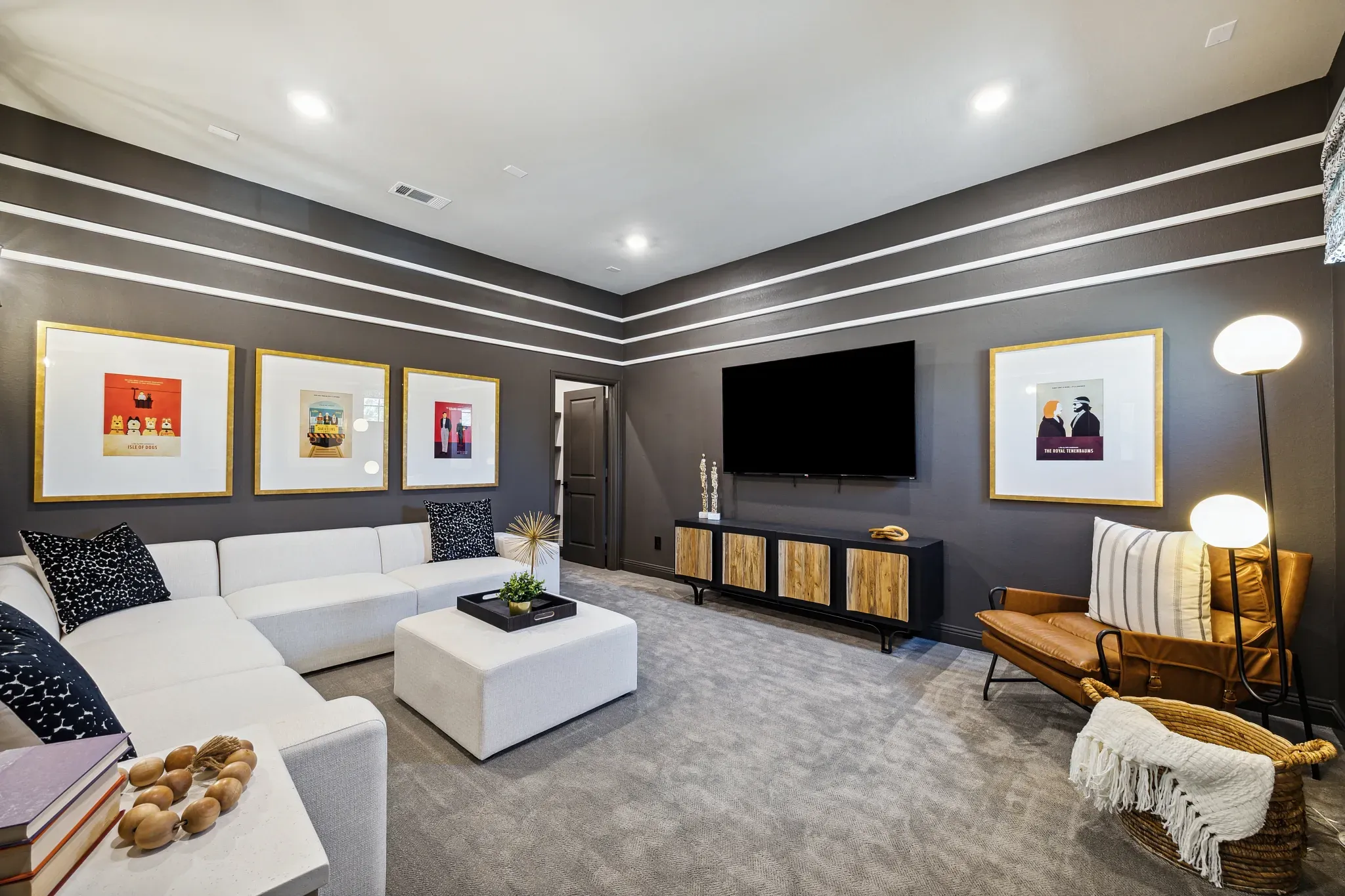 Plan 6020 model at Evergreen - media room