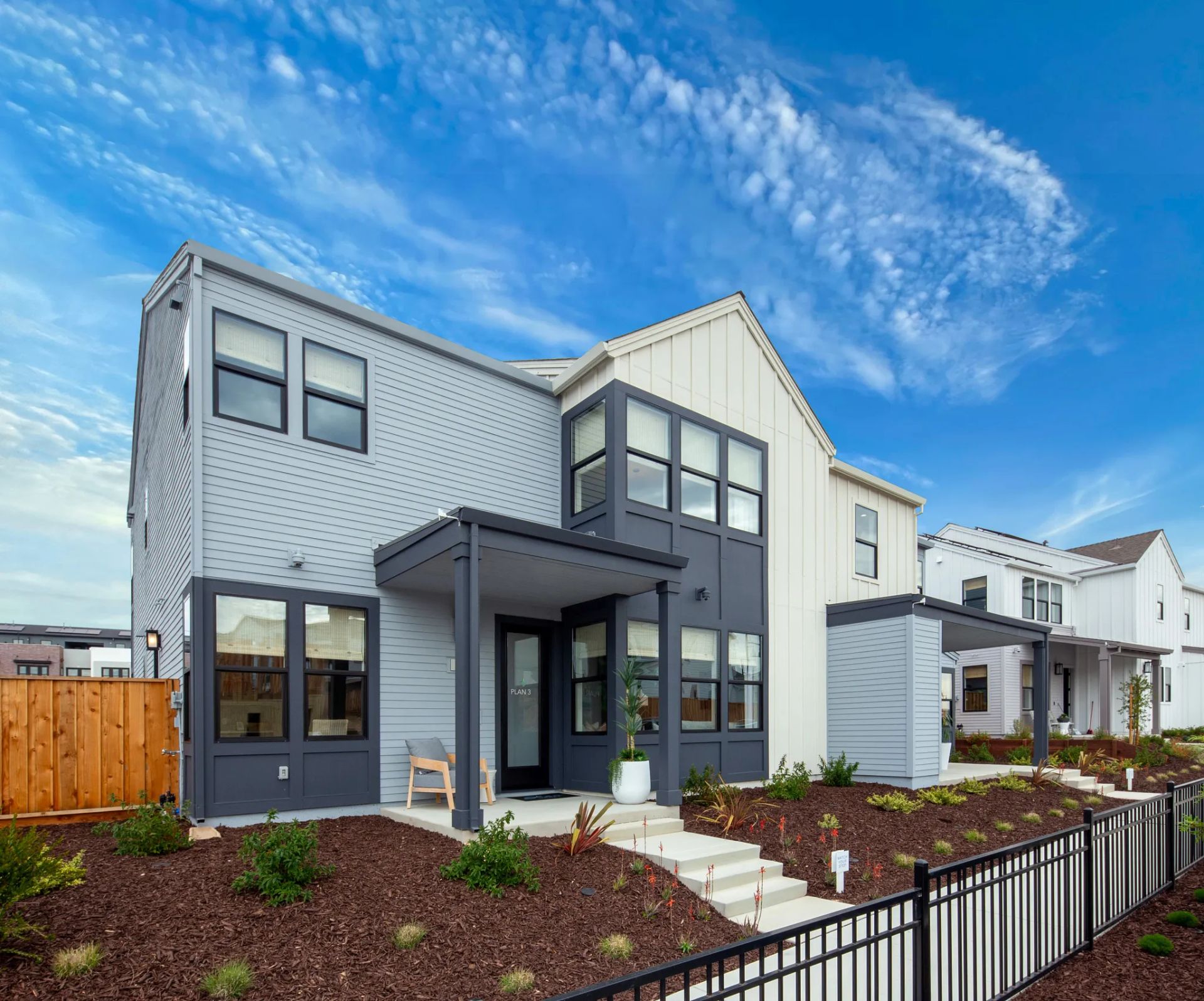 Bay House Plan 3C (left) Model Exterior