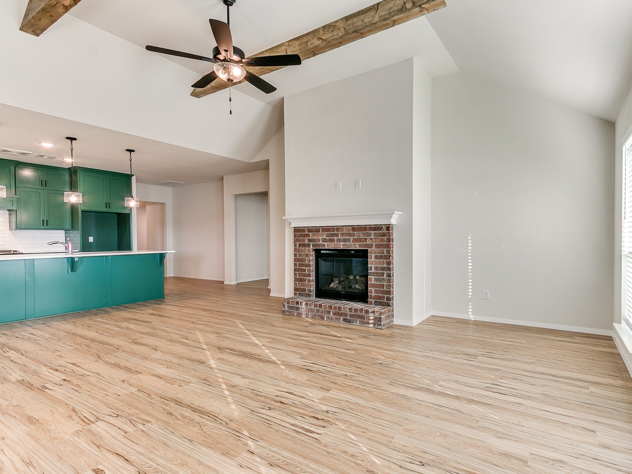 Cadence with Fireplace and Wood Beams