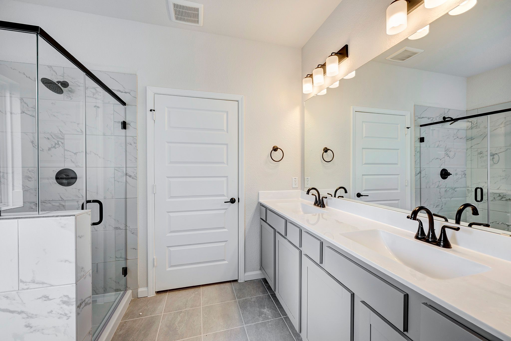 The Davenport II – Primary Bathroom with Dual Vanities and Walk-In Shower