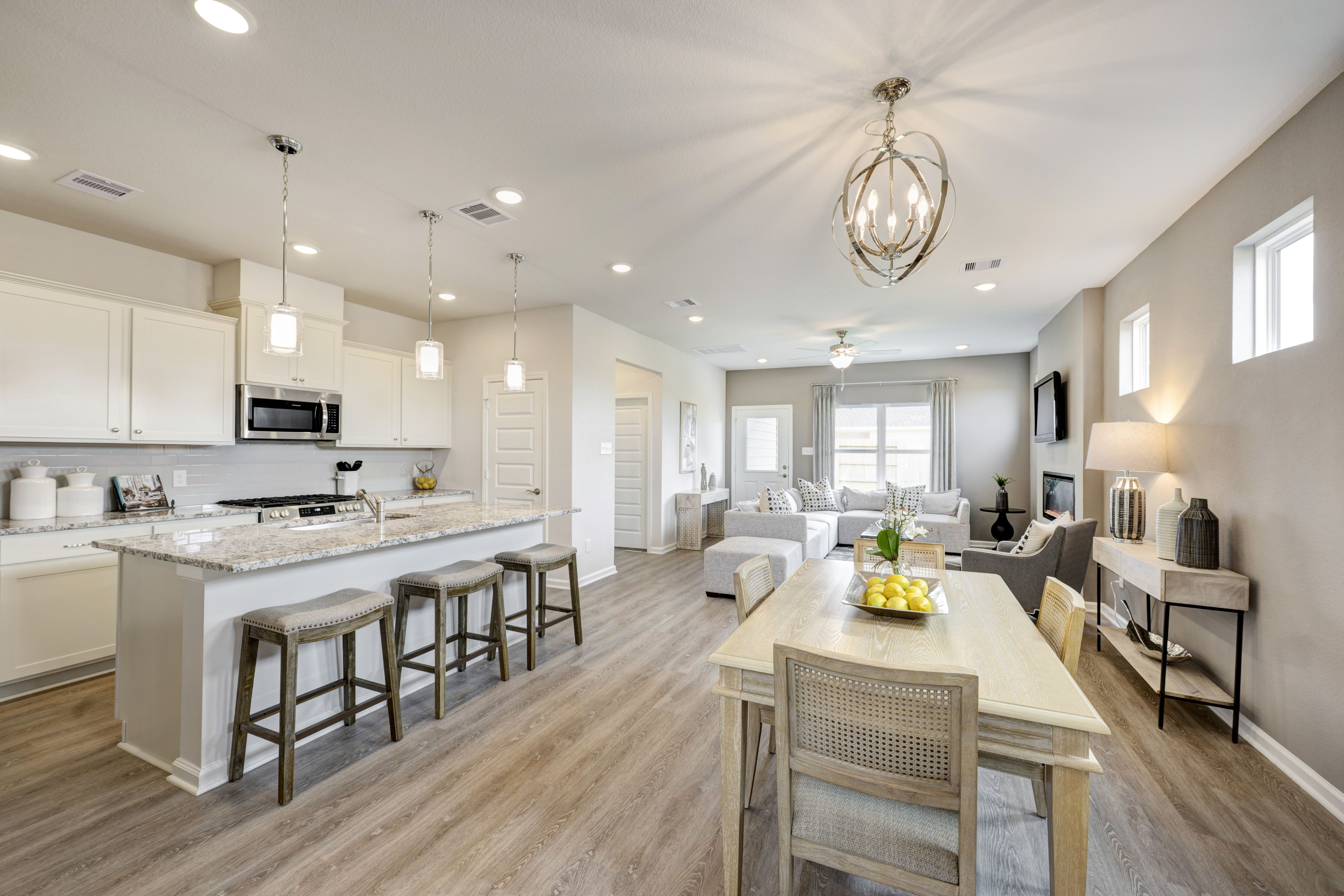 The Robin II- Dining Area into Kitchen and Family Room